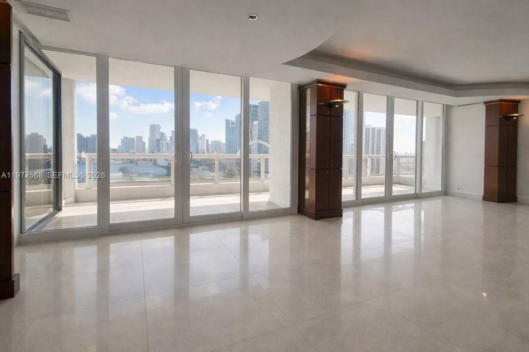 The kitchen has been beautifully renovated, with the former curved wood wall removed to create a more open layout, maximizing the 1, 500 sq.