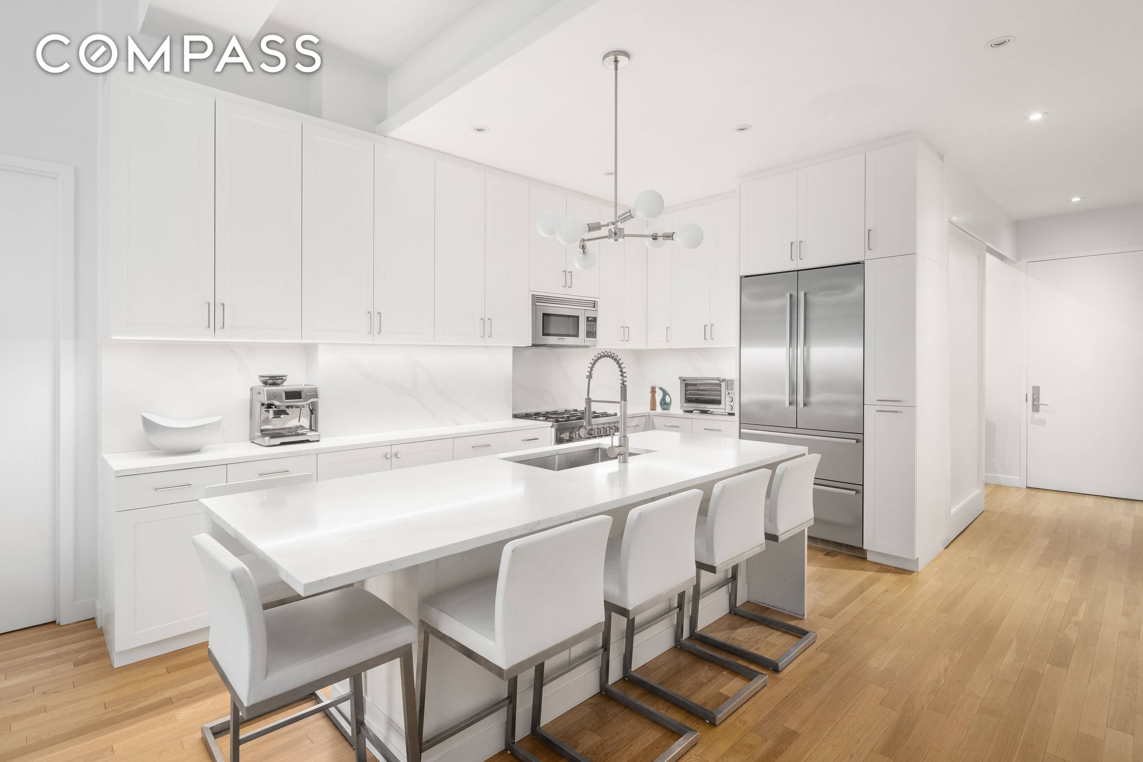 TWO BEDROOM HOME OFFICE TWO FULL BATHS LARGE STORAGE CAGE Welcome to residence 7D, a beautifully renovated split two bedroom with home office located at 59 John Street.
