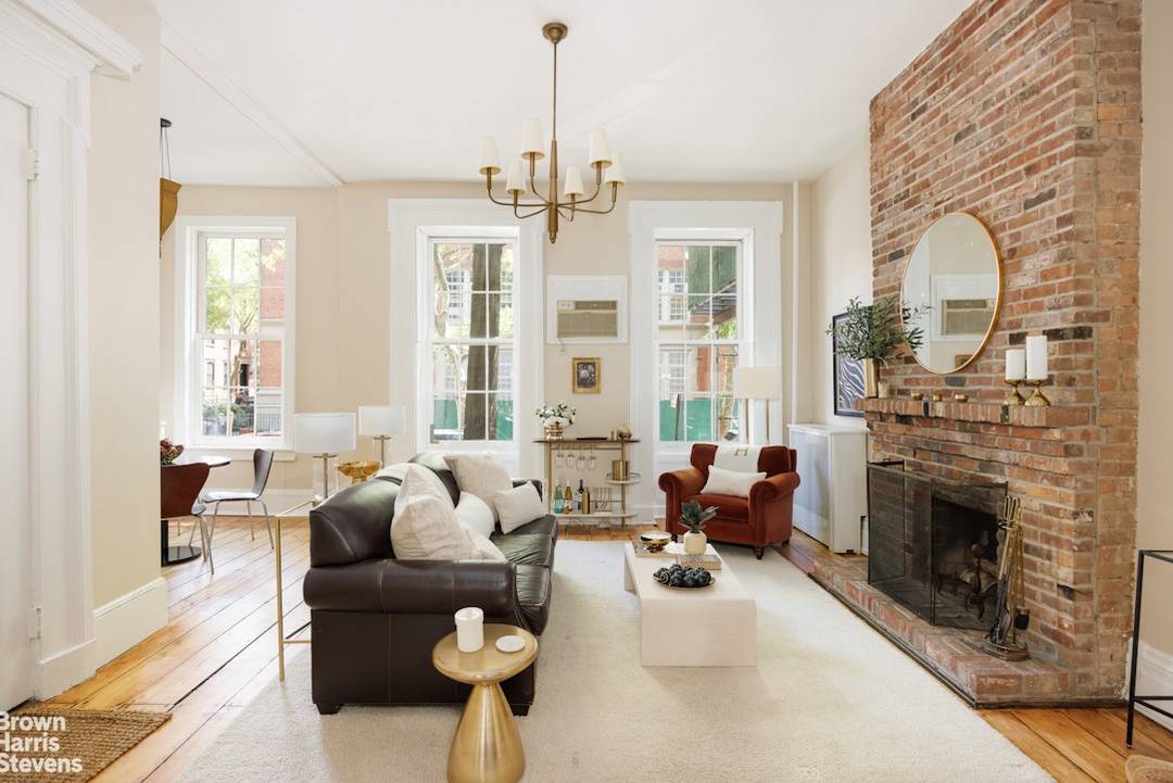 408 Henry Street is a 4 story, 2 family townhouse built circa 1852 in classic Greek revival style.