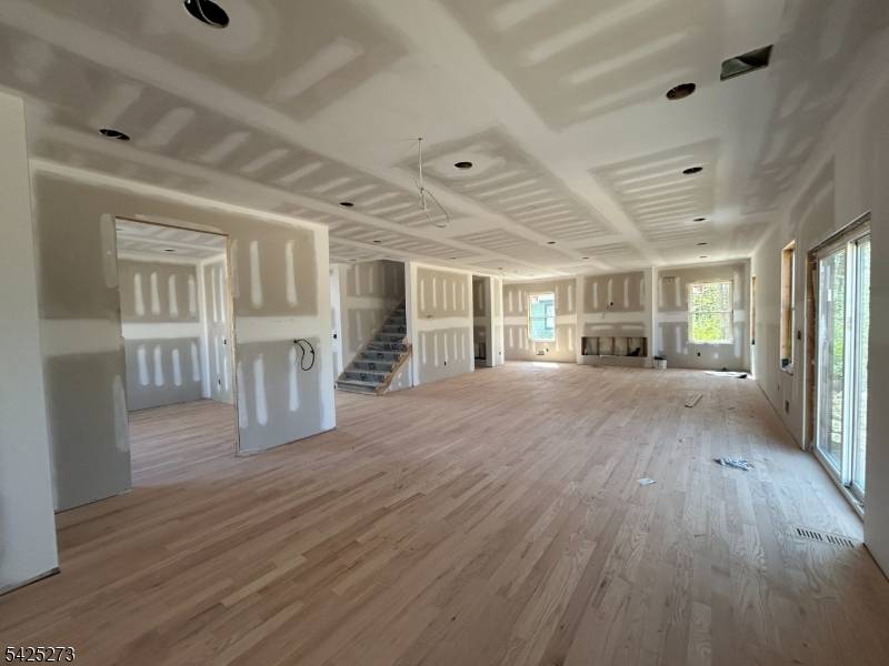 Stunning NEW CONSTRUCTION home, perfectly located on a quite street, yet close to everything.