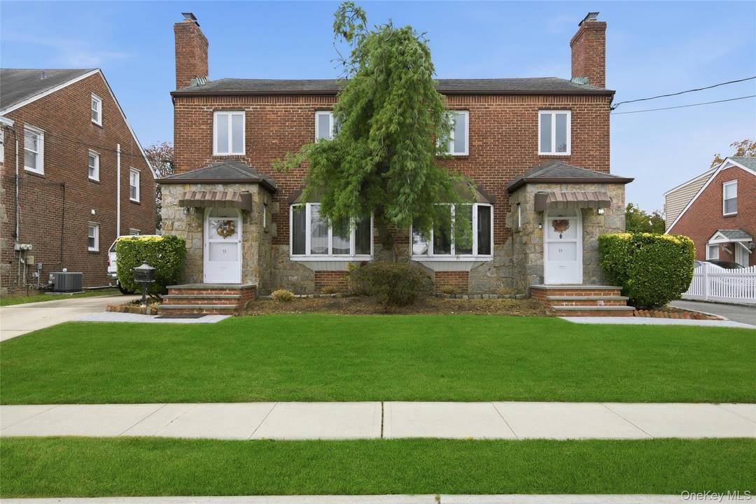 Charming spacious 2 family brick field stone house.