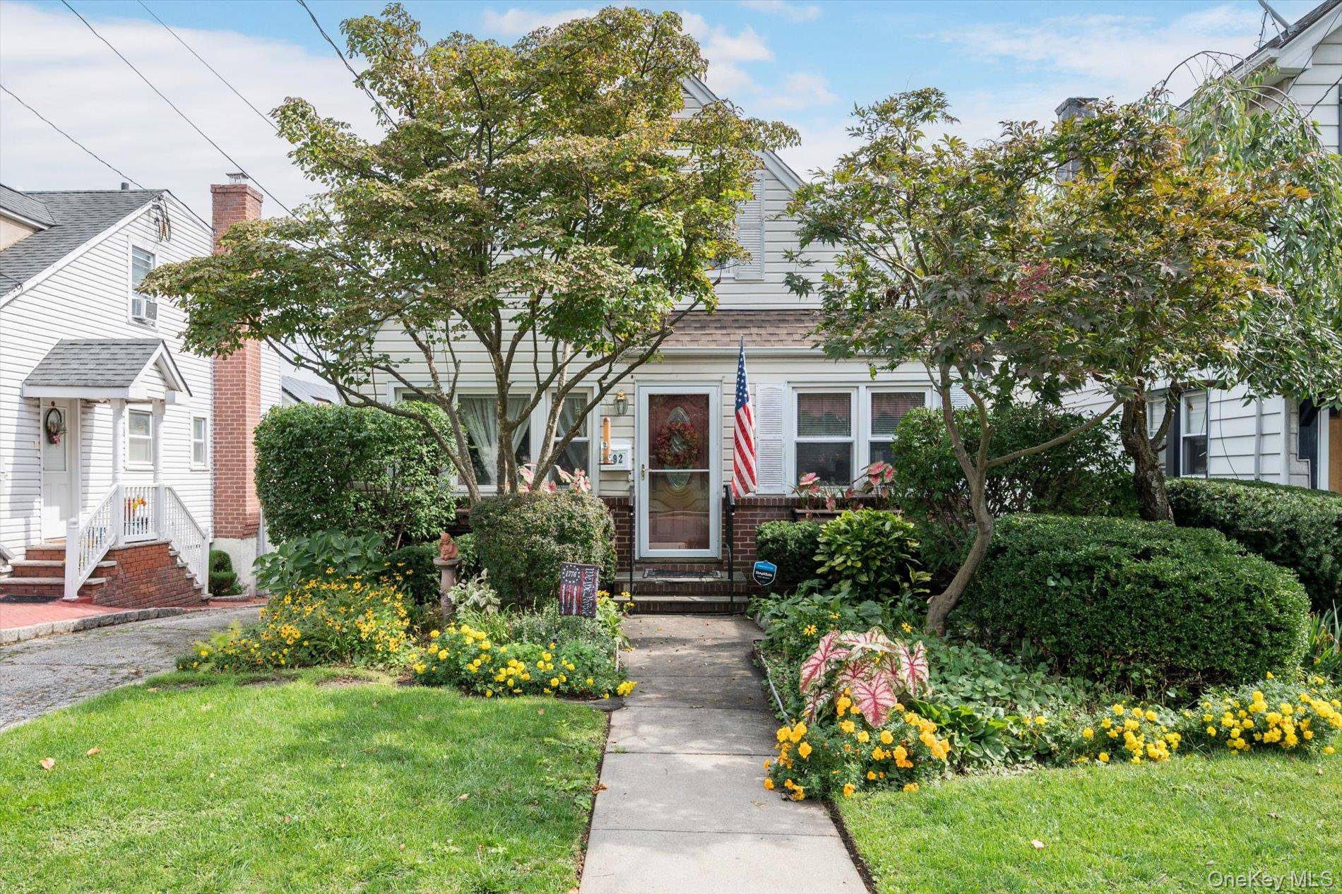 Step into this lovely expanded and updated Cape Cod.
