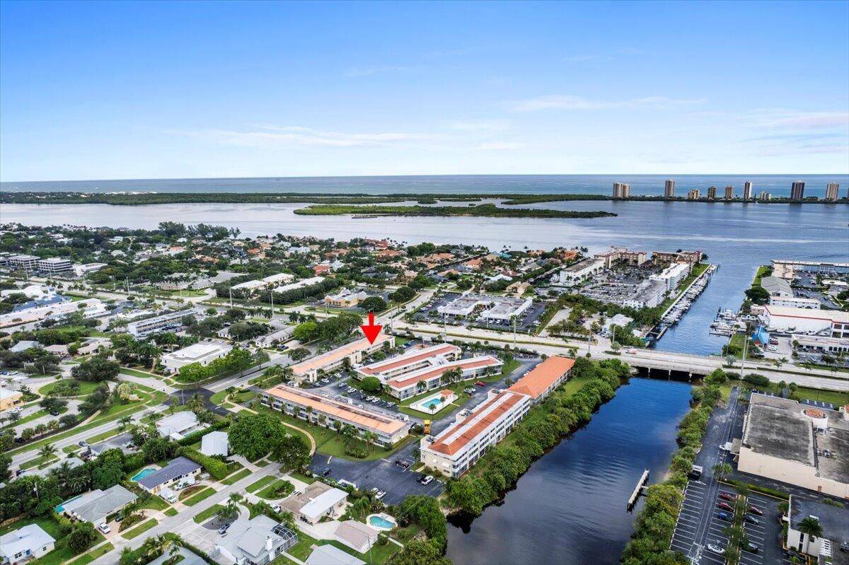 North Palm Beach This affordable 2 bed 2 Bath 1st Floor Condo beautifully decorated and meticulously maintained with new tile floors, Kitchen and Baths.