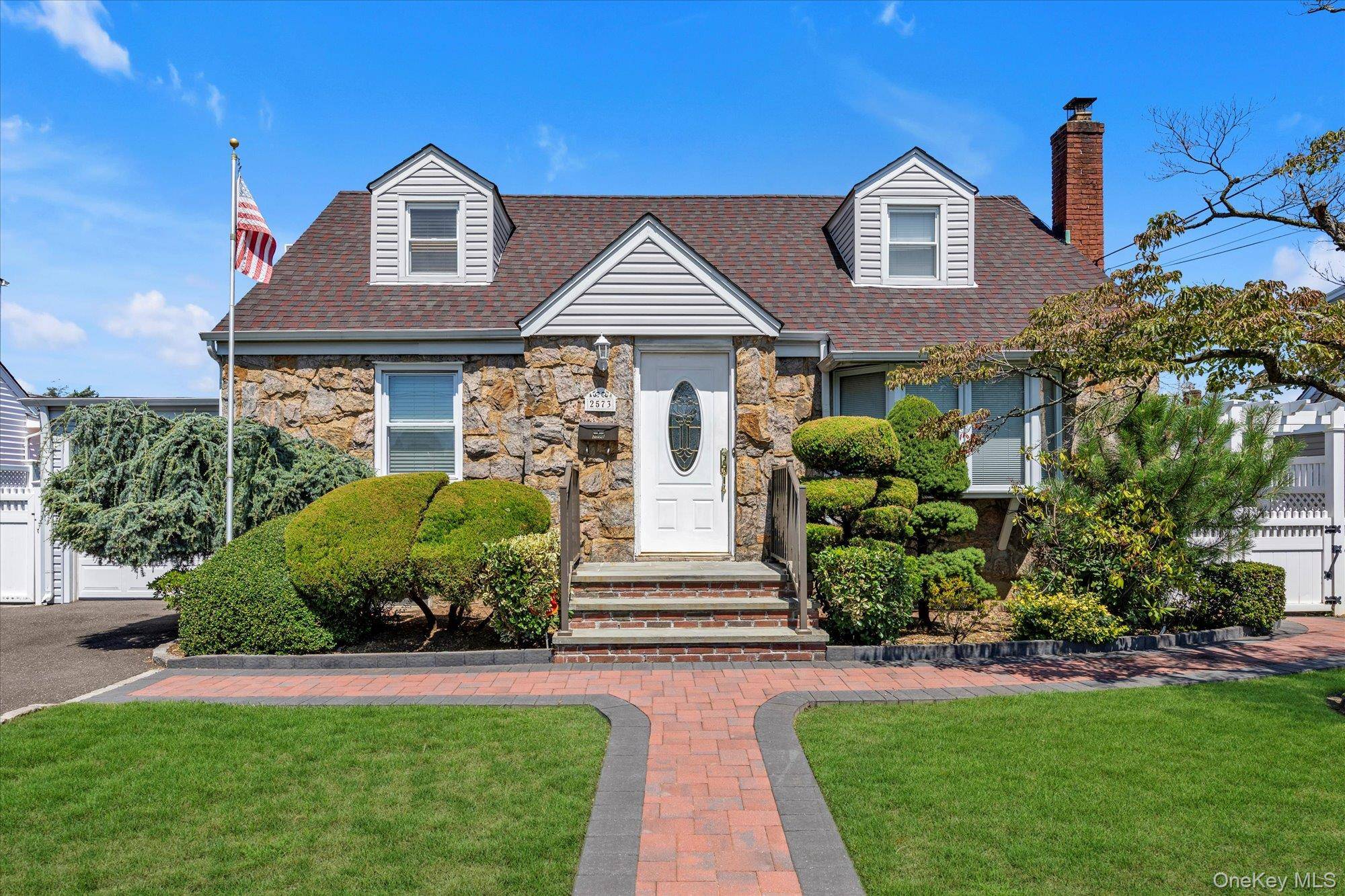 Welcome to this charming Cape in the heart of East Meadow.