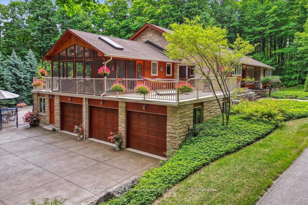 Discover an unparalleled gem rarely available on the market a private and serene estate with a custom designed home that fulfills every dream.