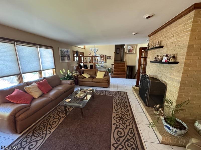 Move in ready custom split level featuring a complete additional living suite with kitchen and a layout designed for comfort and flexibility.