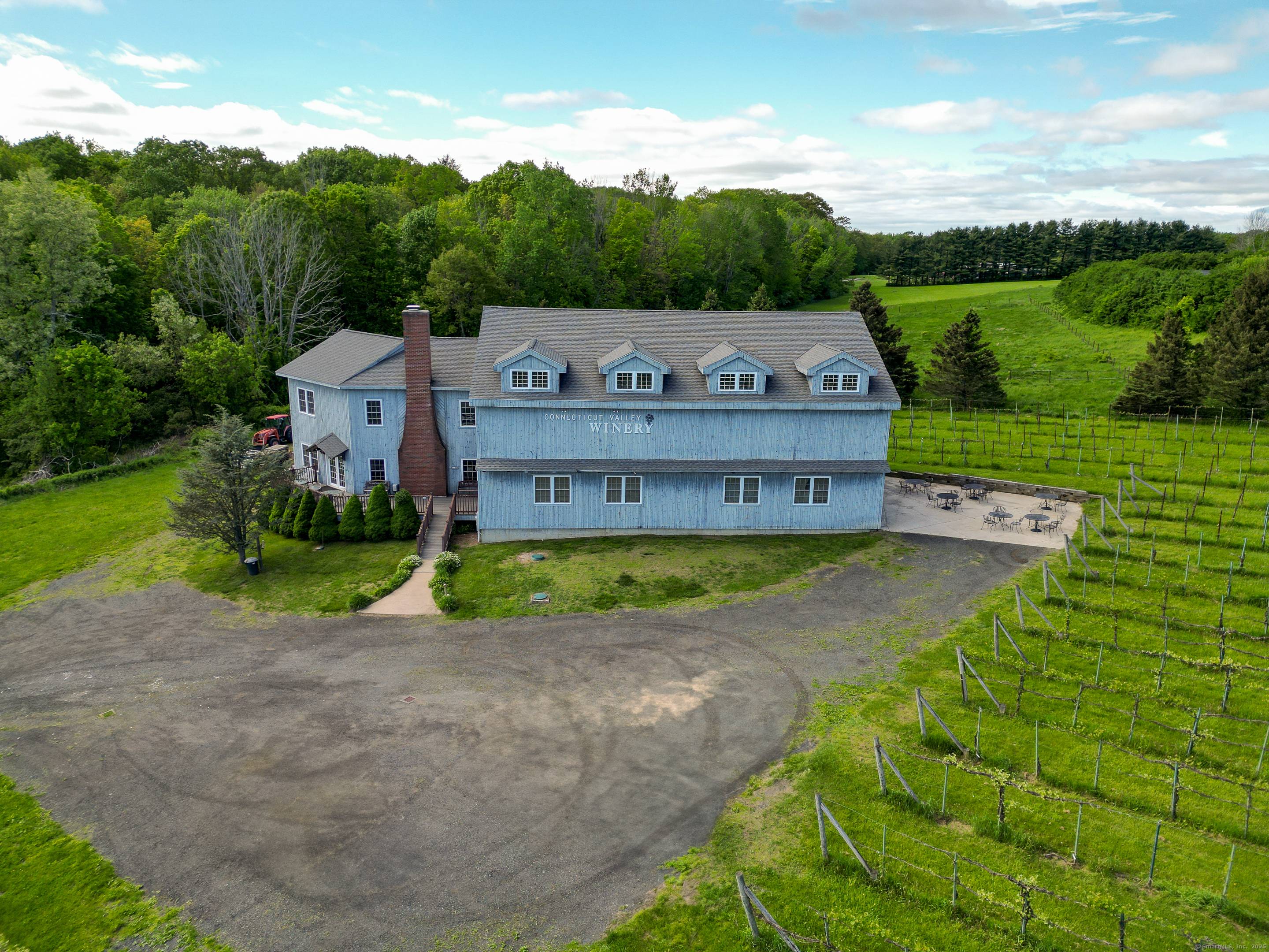 Discover a rare gem tucked away on a stunning 4 acre vineyard in New Hartford, CT a 4, 800 sq.