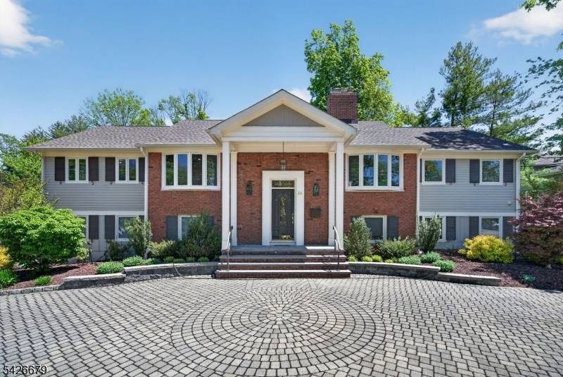 Set on approximately half an acre of beautifully landscaped, flat property in the coveted Poets Section of Short Hills, this exceptional custom 4 bedroom, 3 bathroom home offers timeless elegance, ...