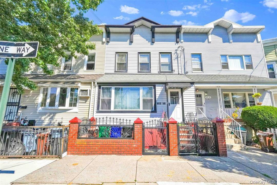 Meticulously renovated and charming two family residence set on a 20x100 lot 2, 000 sq.