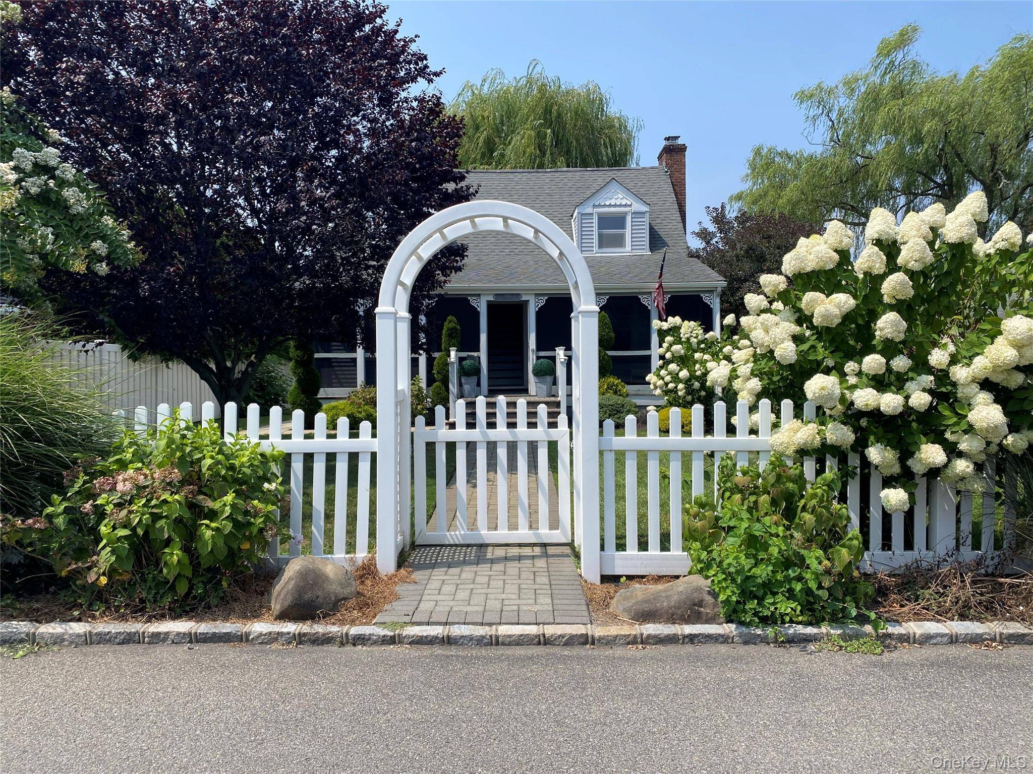 Charming, updated 2 possibly 3 bedroom cape cod home located on a very private street in Seaford.