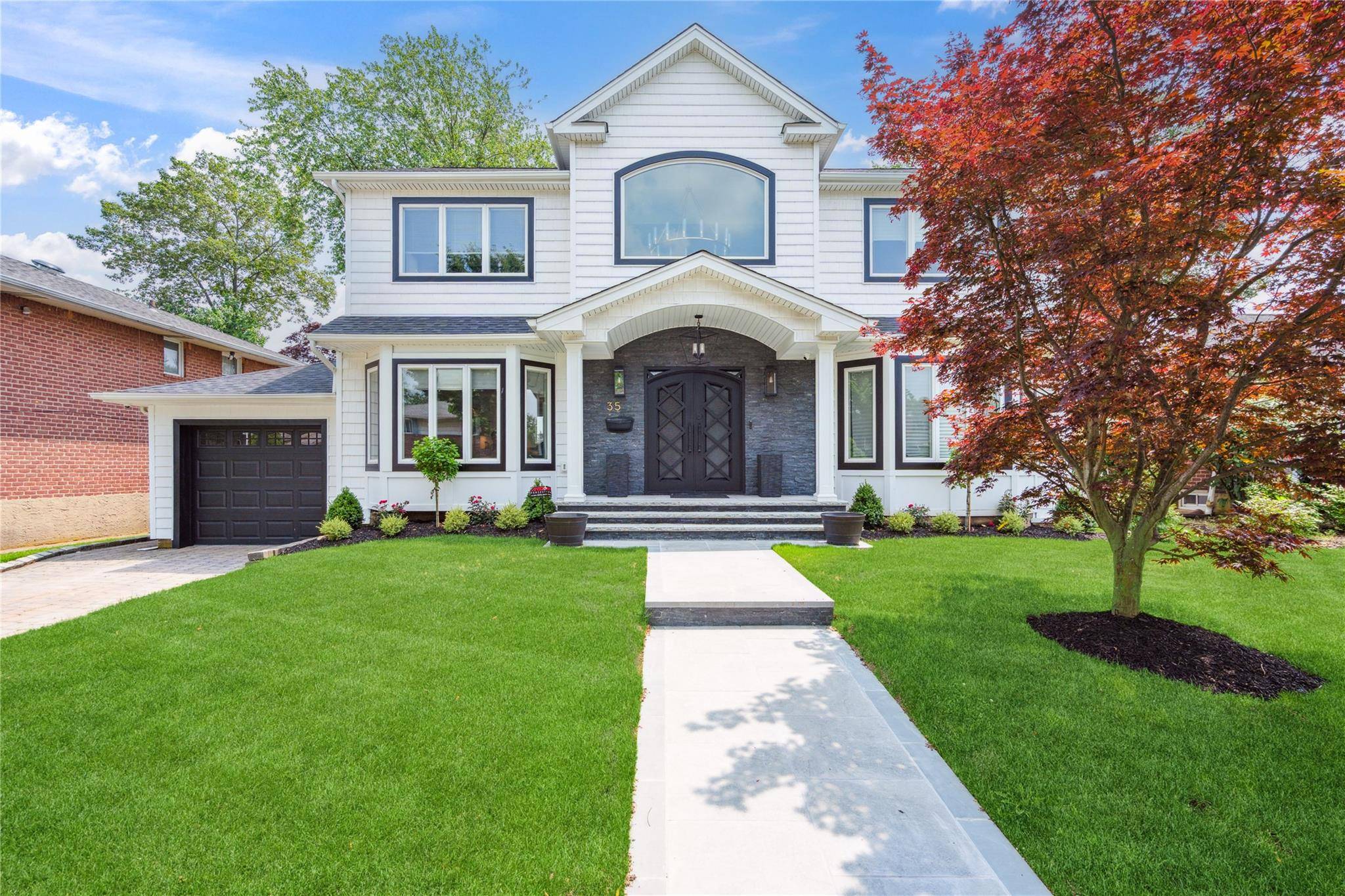 Welcome to this stunning, fully renovated home that blends modern luxury with timeless charm.