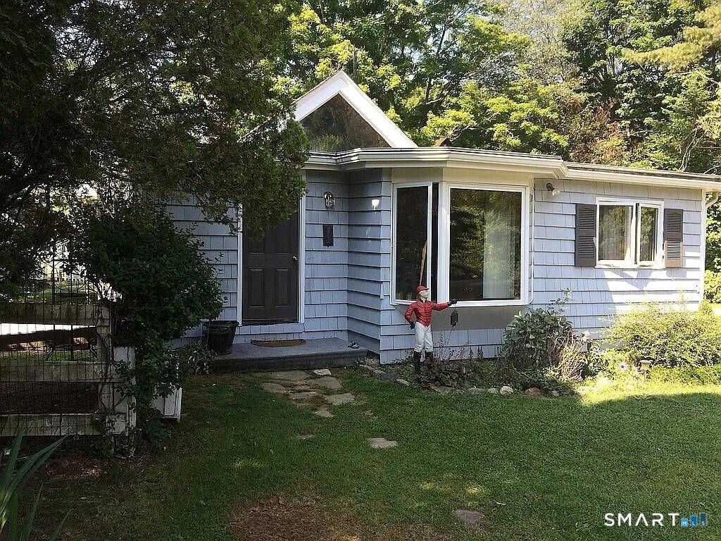 Cottage with post and beam Barn with loft on 15 acres.