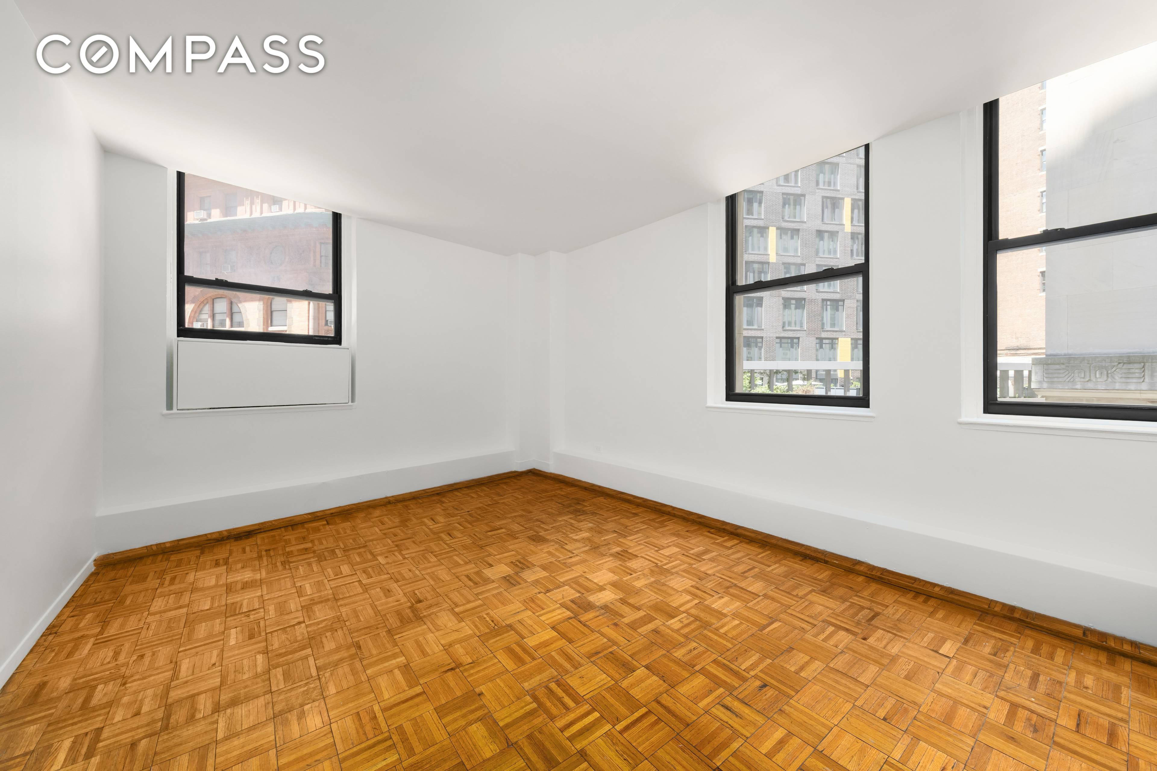 A spacious, bright, corner 1 Bedroom, 1 Bathroom with great potential !