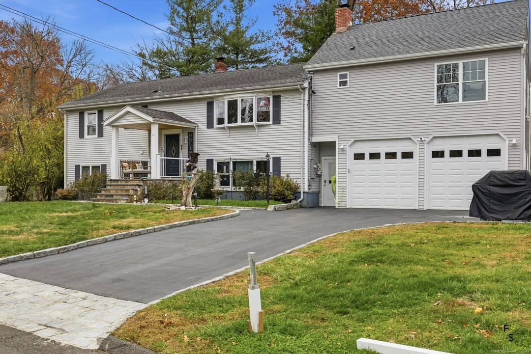 Welcome to 29 Priscilla Road in Norwalk, CT, a stunning and spacious Hi Ranch style home nestled on a quiet residential street in one of the city's most desirable neighborhoods.