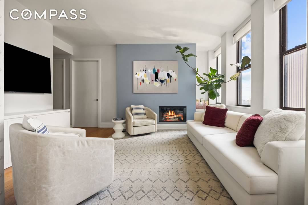 Residence 17D at 150 Nassau Street is a light filled two bedroom, two bath condominium defined by a seamless layout designed for modern living.