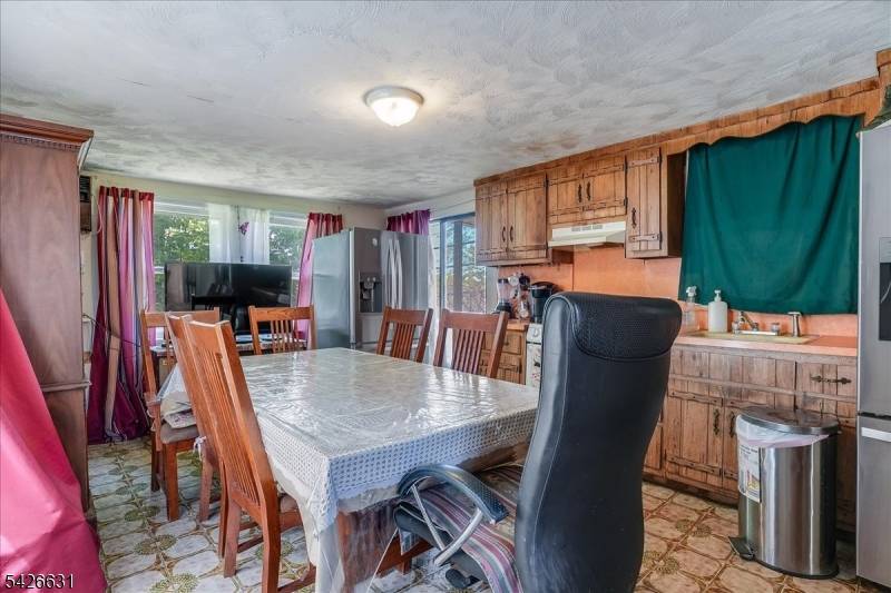 True 2 family home with tons of potential.