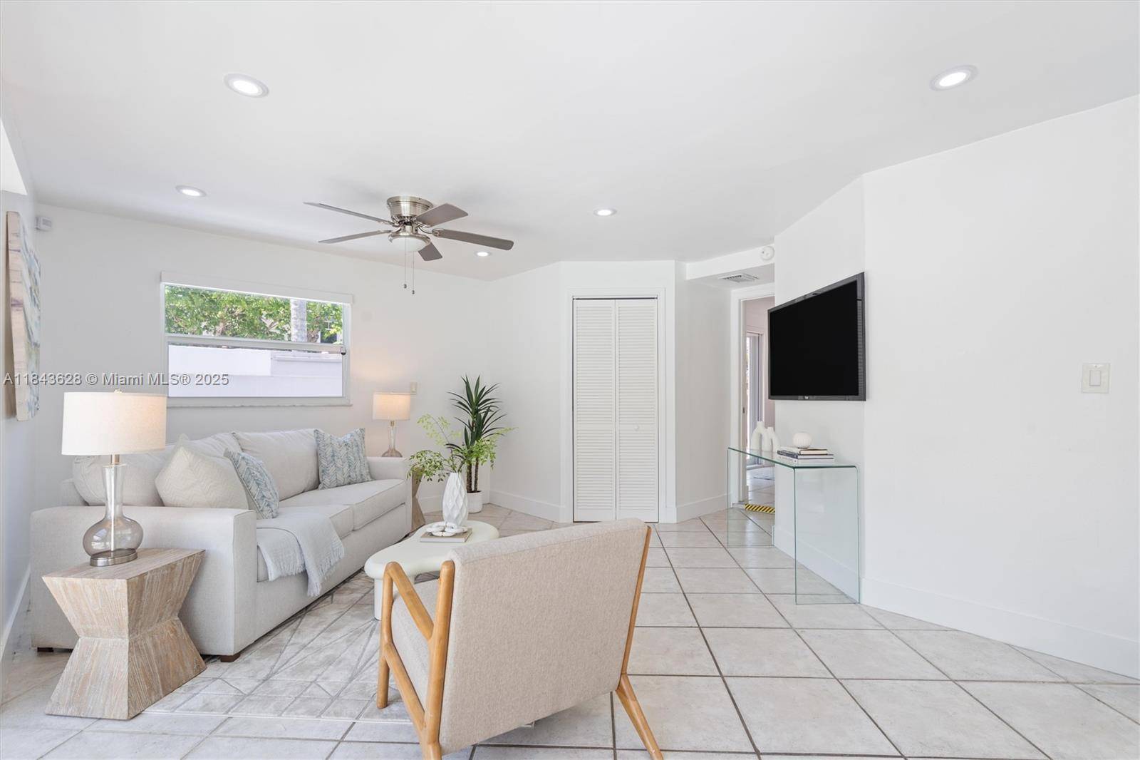 This charming Mid Century POOL home on a corner lot in East Fort Lauderdale !