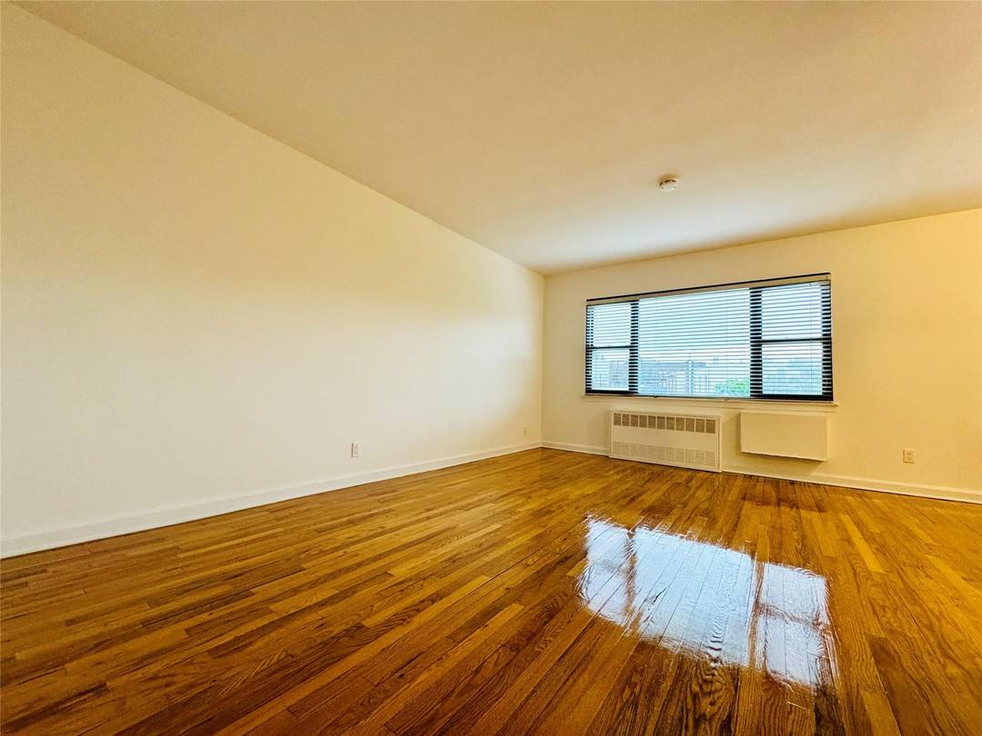 Welcome to this beautifully maintained top floor apartment in the vibrant and highly sought after neighborhood of Woodside, Queens !