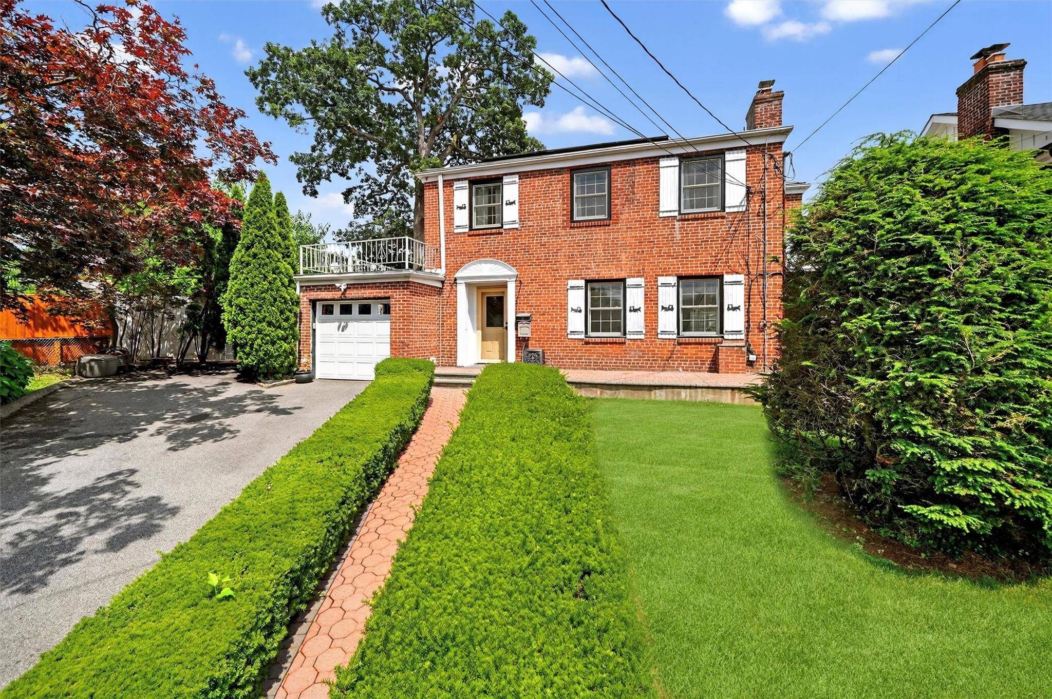 Welcome to 23 Westmoreland Drive a beautifully maintained brick Colonial on an oversized lot in desirable Beverly Crest.