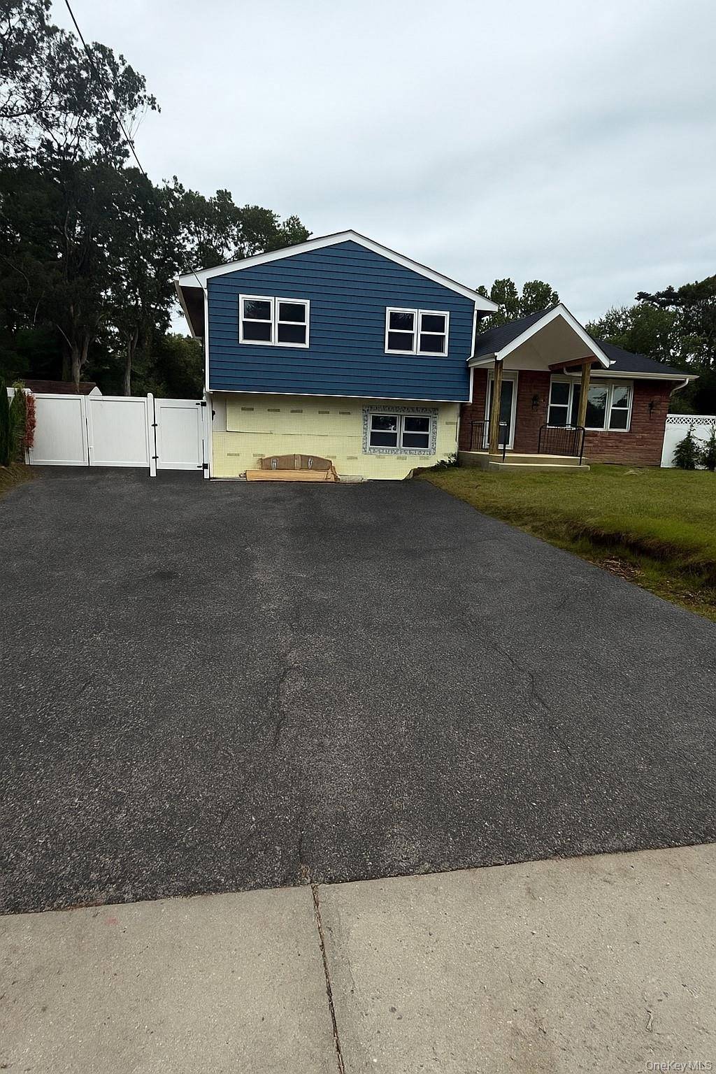 Fully renovated home on a spacious lot in prime Ronkonkoma.