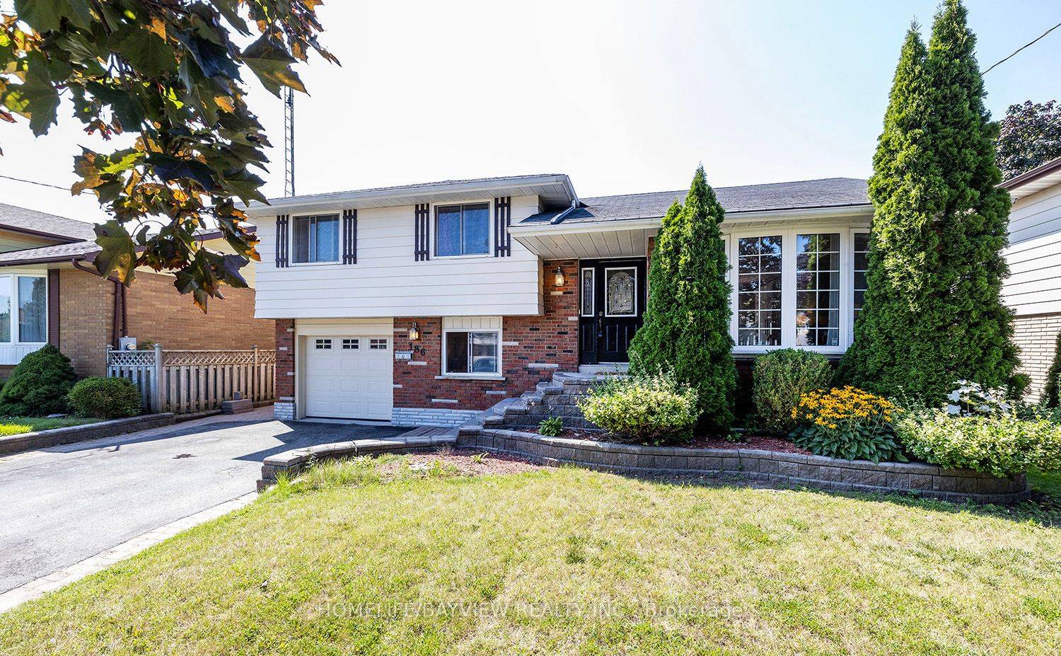 Welcome to this Delightful sun filled spacious updated 5 level side split nestled in the heart of the lively Donevan neighborhood !