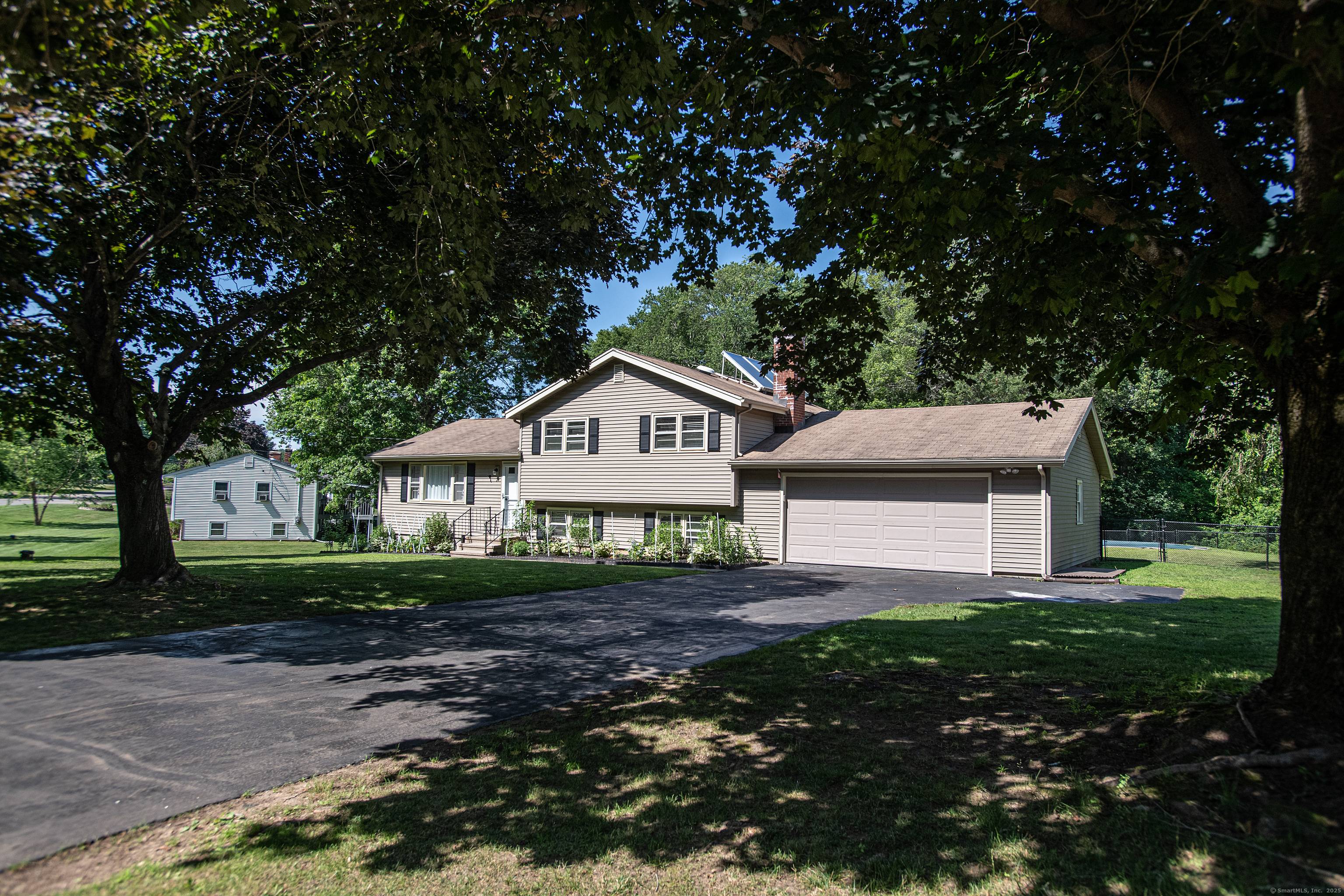 Welcome to this beautifully updated 4 bedroom, 2 bath split level home with a sleek, contemporary design.