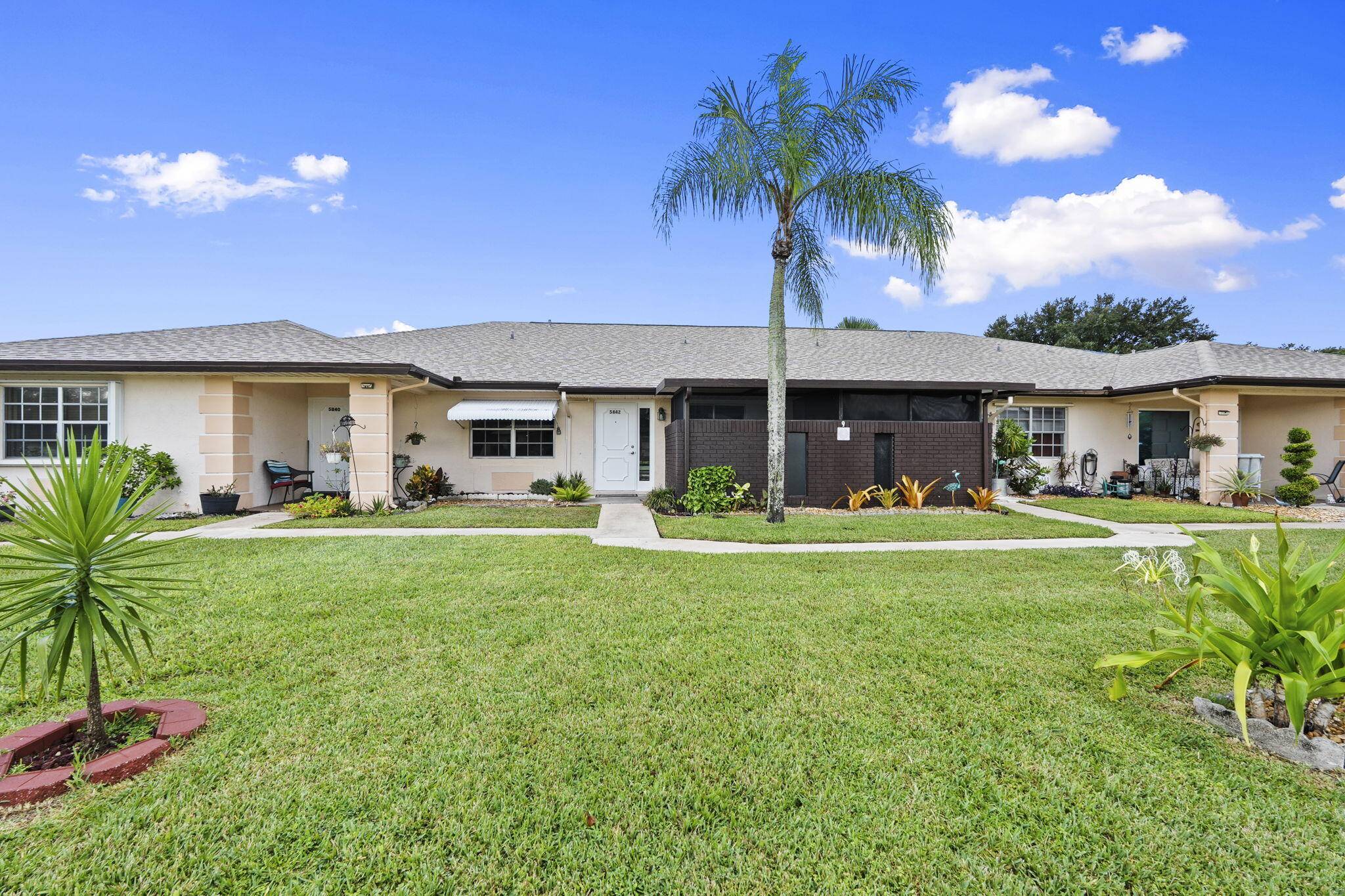 Completely remodeled unit 2025 Porcelain tile throughout, including BOTH porches !