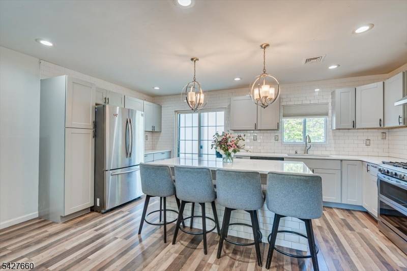 Welcome to this beautiful 5 bedroom, 3 bath split level home, perfectly situated on a desirable corner property in a highly sought after neighborhood.
