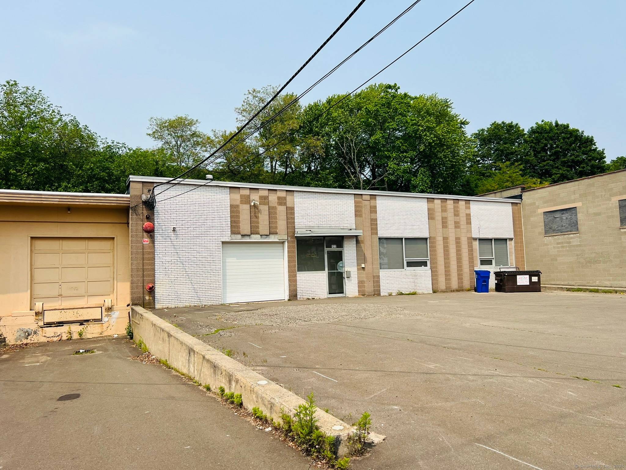 Available now a well maintained 6, 000 sq ft industrial commercial property offering a seamless blend of warehouse and office space.