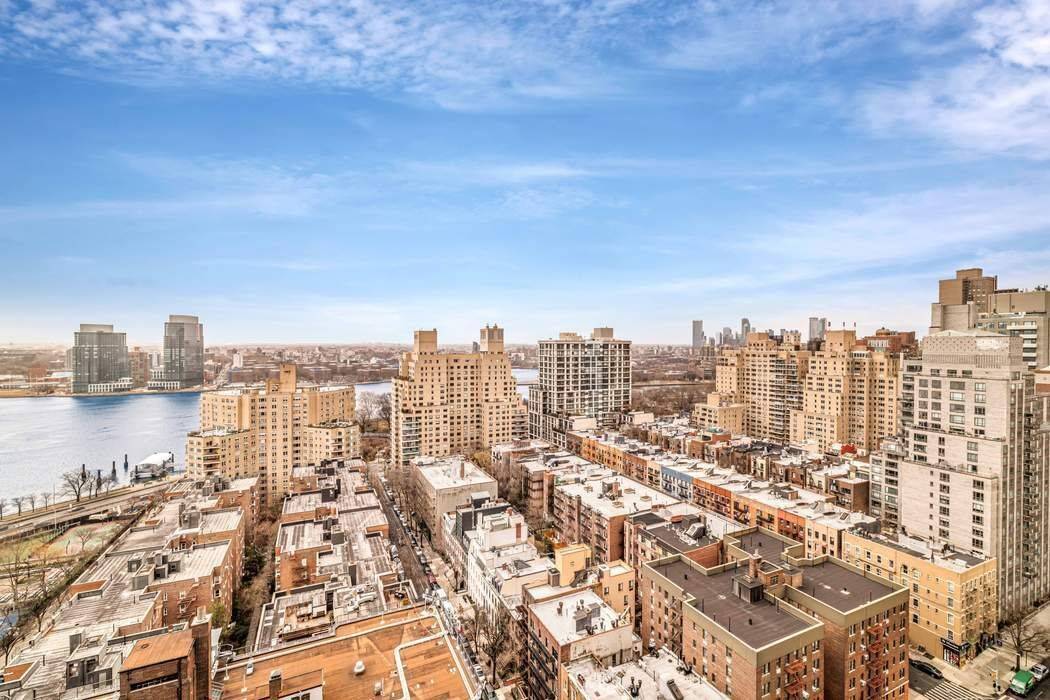 Spectacular river and city views from ALL rooms of this beautifully renovated home.