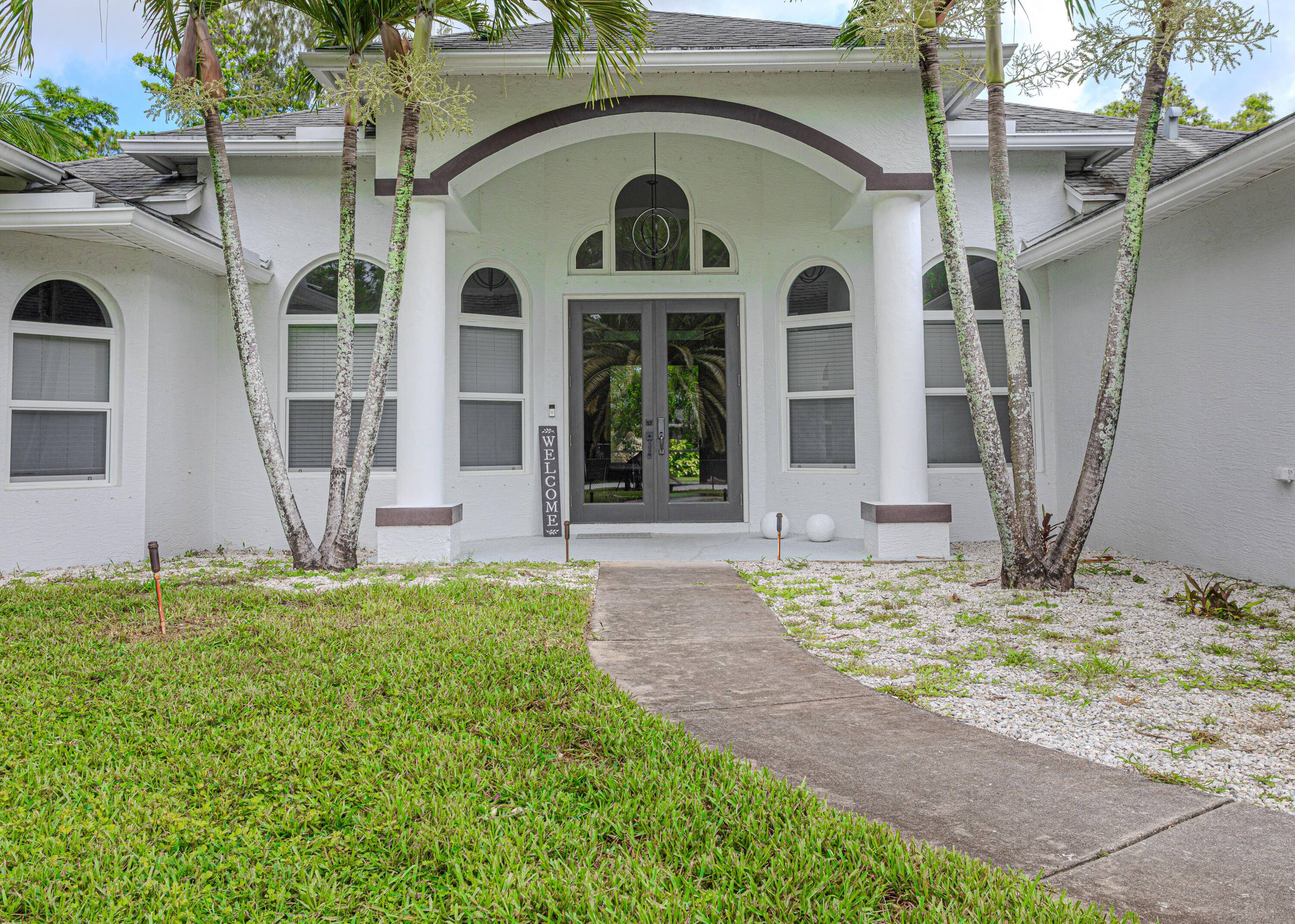 Escape to your private oasis in The Acreage !