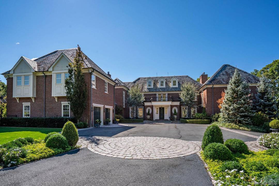 This Gated Majestic Brick Manor, features 6 bedroom, 6 bath, 3 powder rooms and sits at one of the highest points on Long Island surrounded by lush parkland and English ...