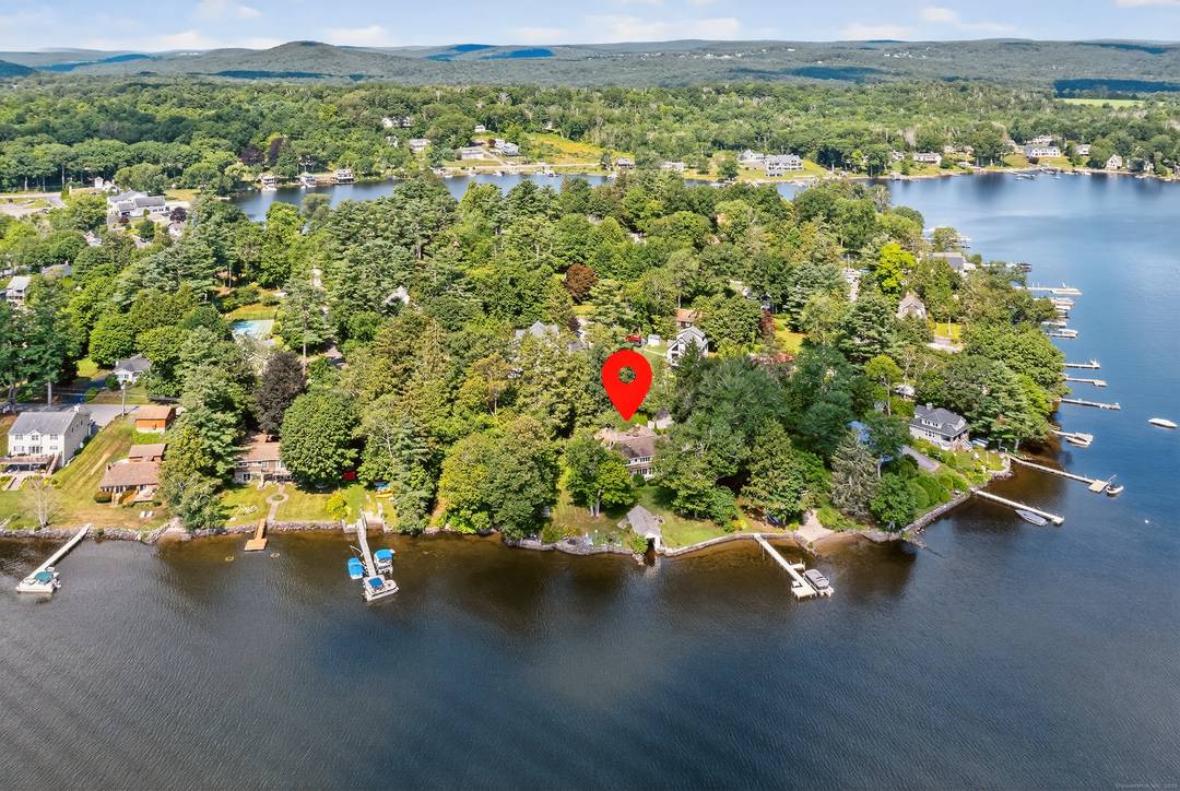 Set on one of Deer Island's largest waterfront parcels, this 1920s lake house offers approximately 3, 500 square feet of living space across five bedrooms and approximately 180 feet of ...