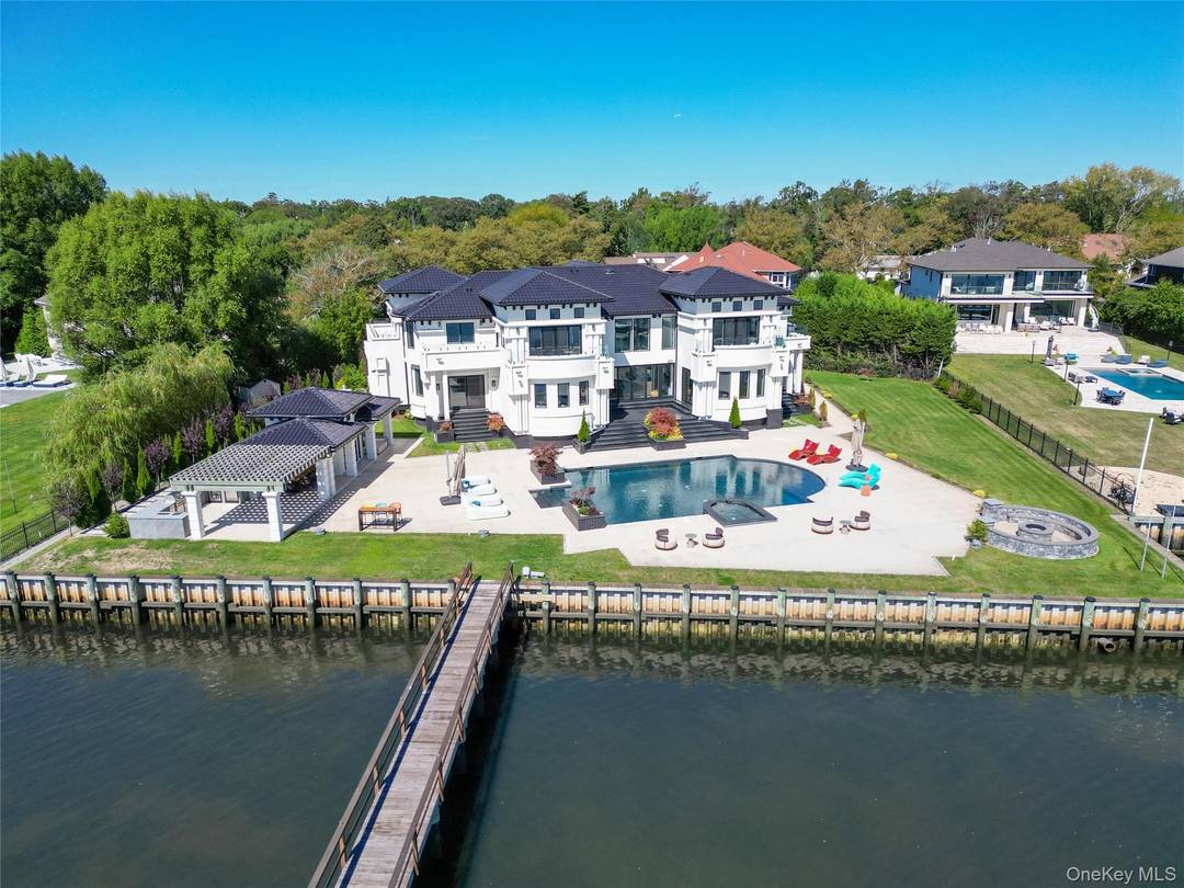 Experience modern luxury at its finest in this newly constructed 9, 200 sq.