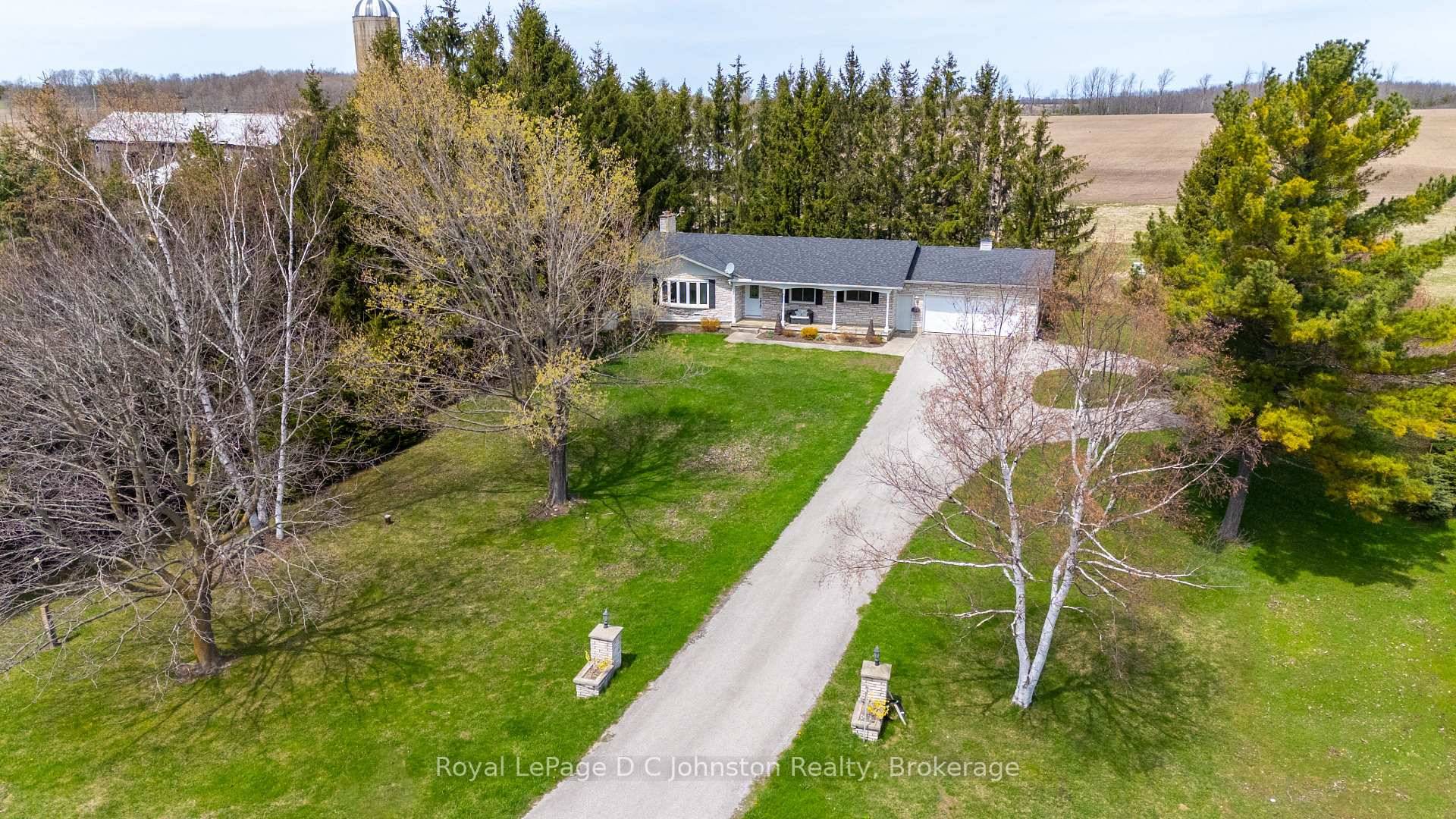 Embrace the essence of rural living in this custom built stone bungalow set on over 3 acres, conveniently located between Saugeen Shores and Owen Sound, and a short drive to ...