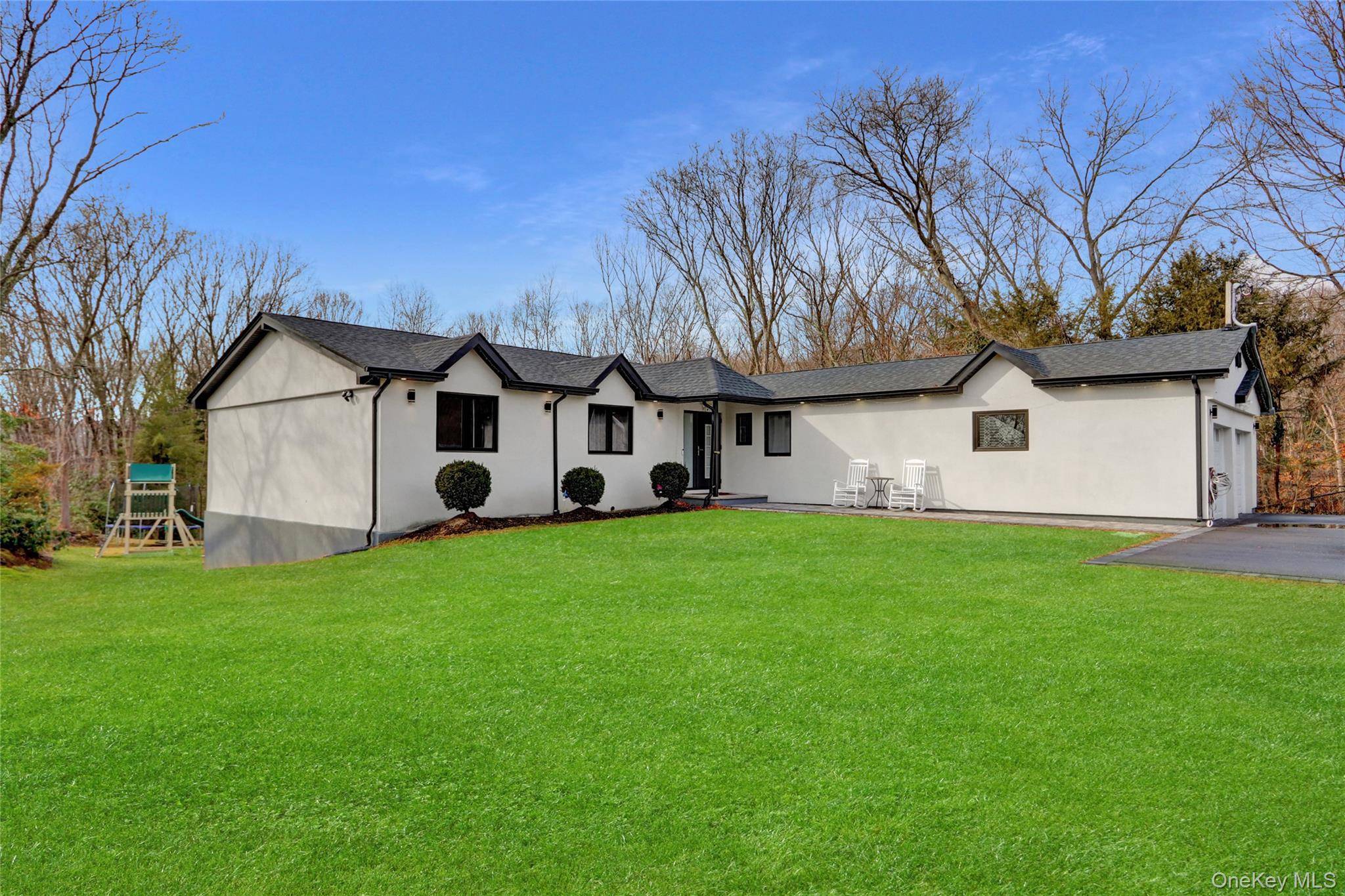 Sprawling ranch fully renovated 2022 with Beautifull curb appeal sitting on 1.