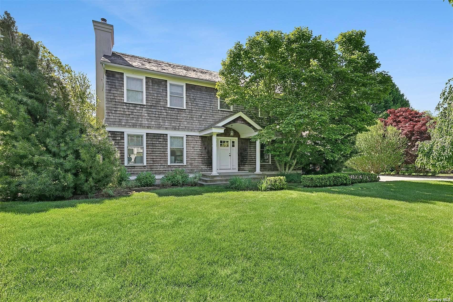 Located less than half a mile from the Village of Westhampton Beach, this 4 bedroom, 3.