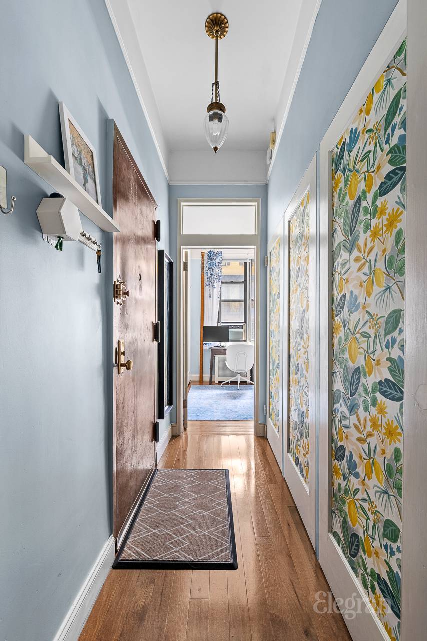 Apartment 1A is a beautifully renovated 2 bedroom, 1 bath maisonette located in an intimate prewar Beaux Arts co op on a quiet, tree lined block.