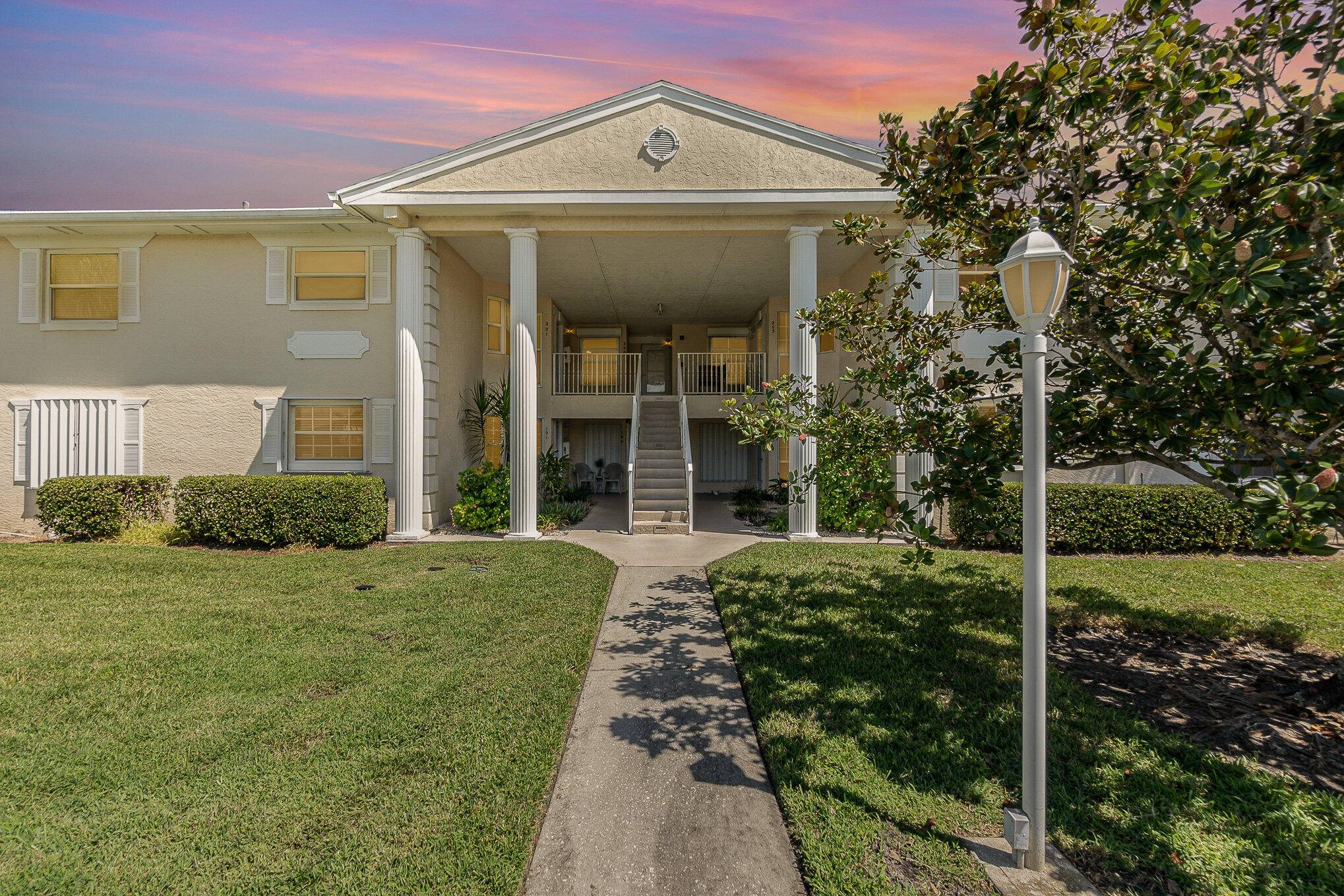 Welcome to this appealing well maintained residence in the active waterfront community of Grove Isle.