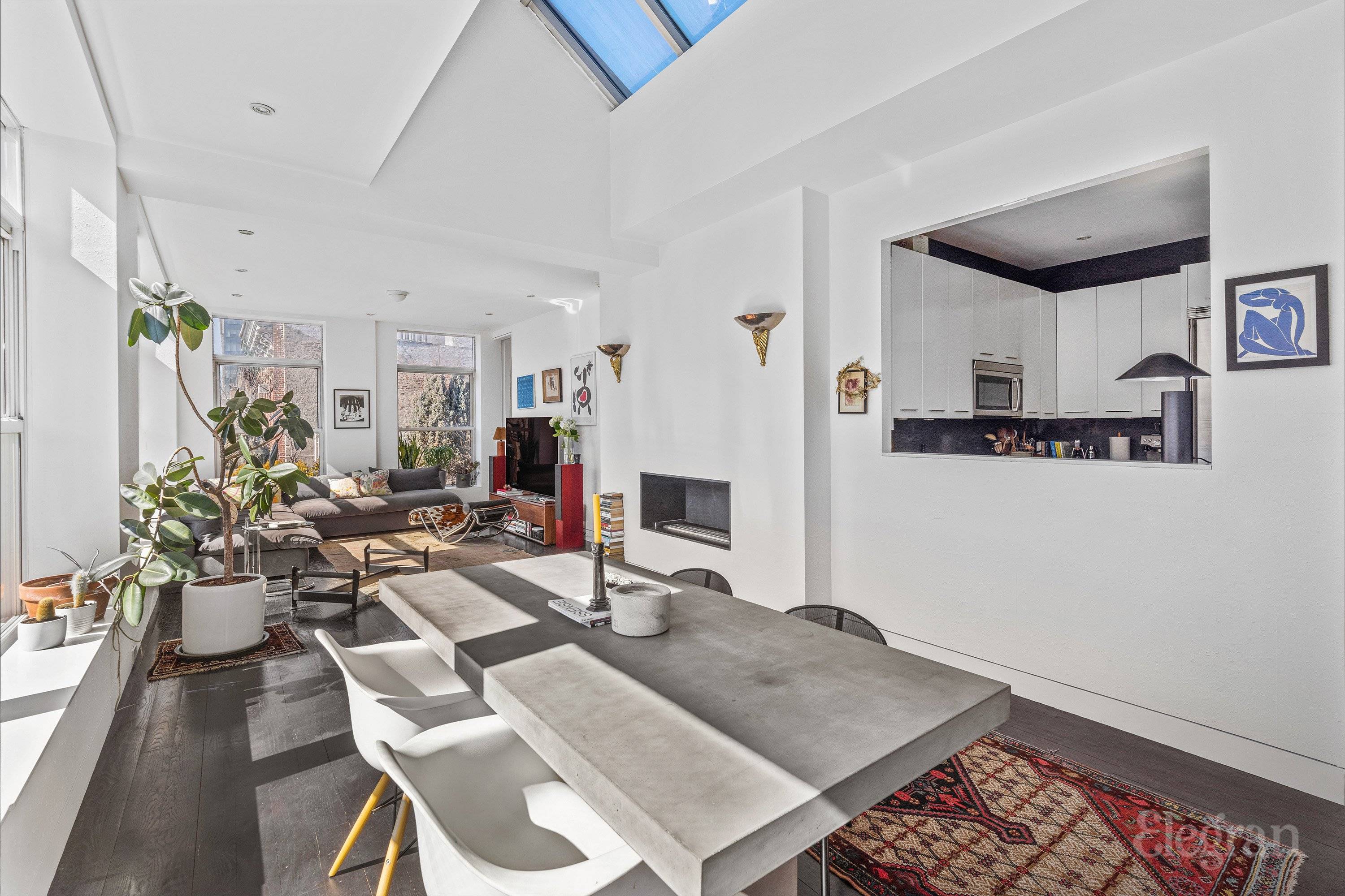 Nestled in the heart of the East Village on the buildings top floor, this truly unique and stylish condo home is a rare find, bathed in natural light and designed ...