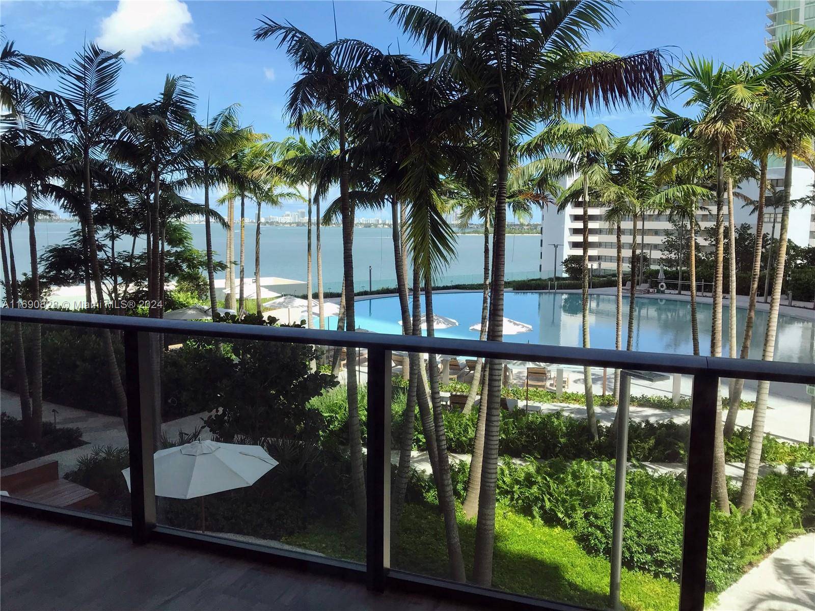 Breathtaking Condo in the iconic Paraiso Bay, Private Elevator and Foyer, offering stunning bay, pool and skyline views.