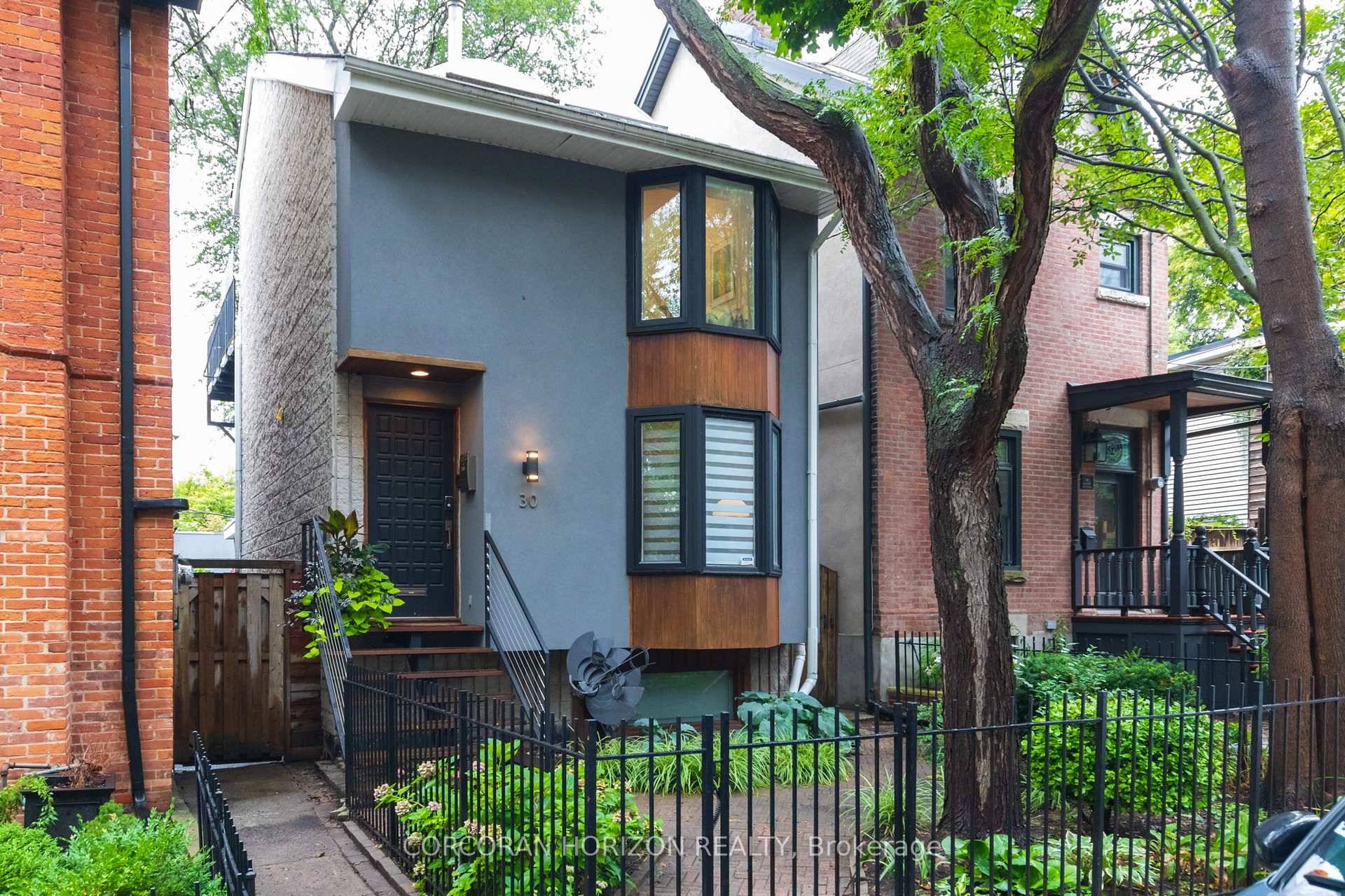 This exceptional detached residence combines striking architectural design with thoughtful functionality, offering a quiet retreat just steps from Riverdale Park.