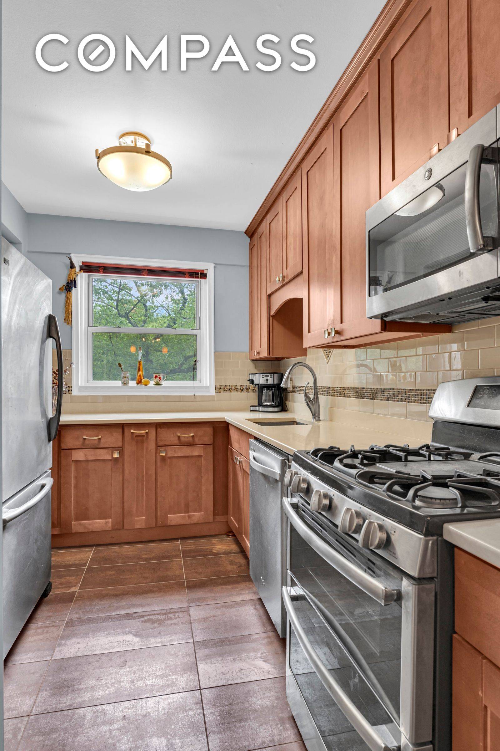 SPUYTEN DUYVIL HUGE TWO BEDROOM NESTLED IN THE TREES WITH YOUR OWN DEEDED PARKING SPOT INCLUDED !