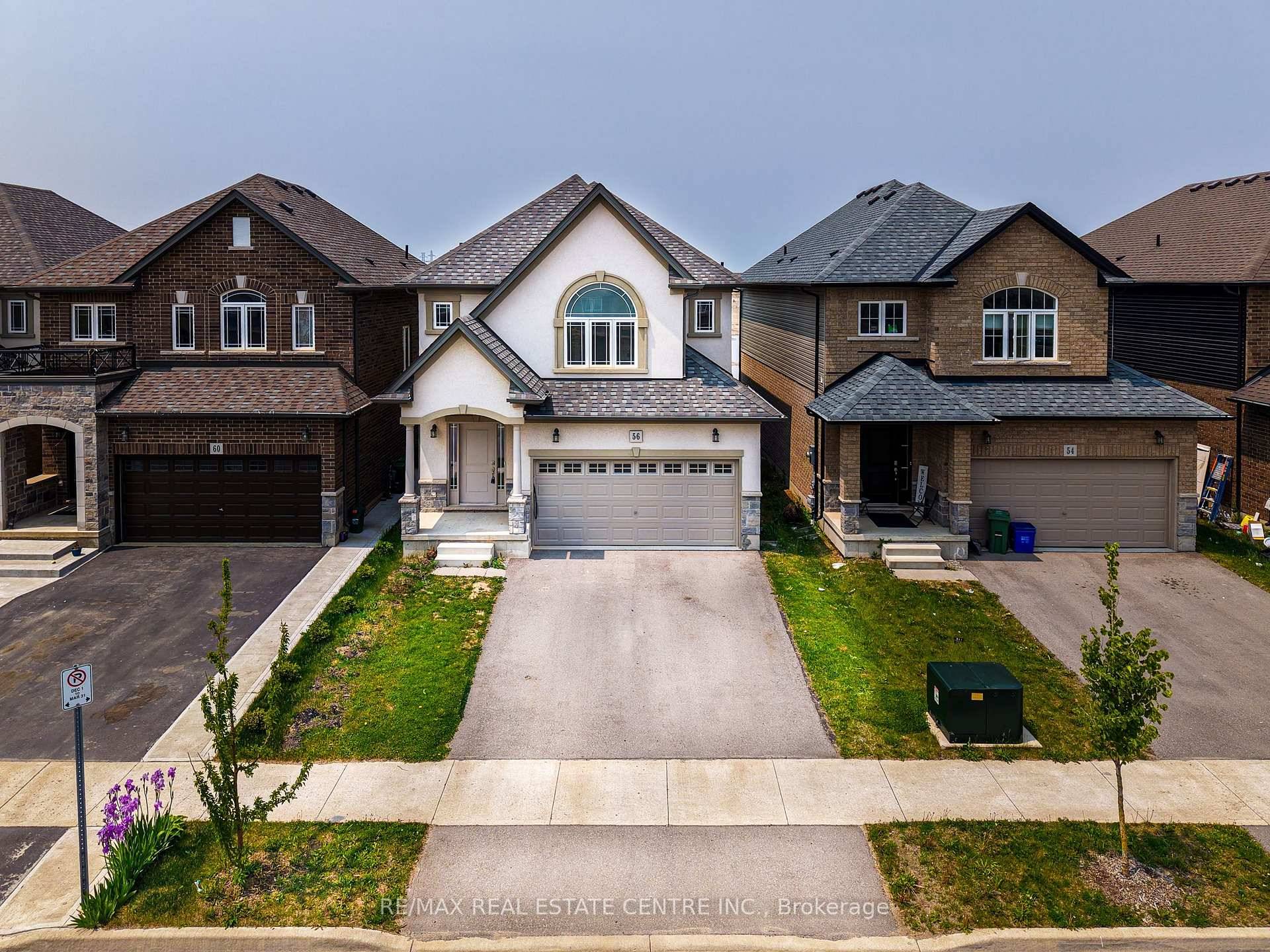 Welcome to 56 Rockledge Drive a spacious and sunlit 4 bedroom detached home backing onto a serene pond and walking trail in a family friendly Hamilton neighbourhood.
