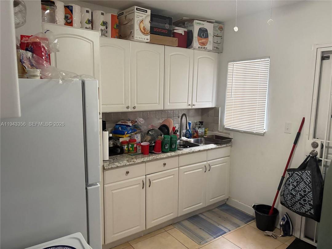 Cozy 2 1 home. Tiled throughout.