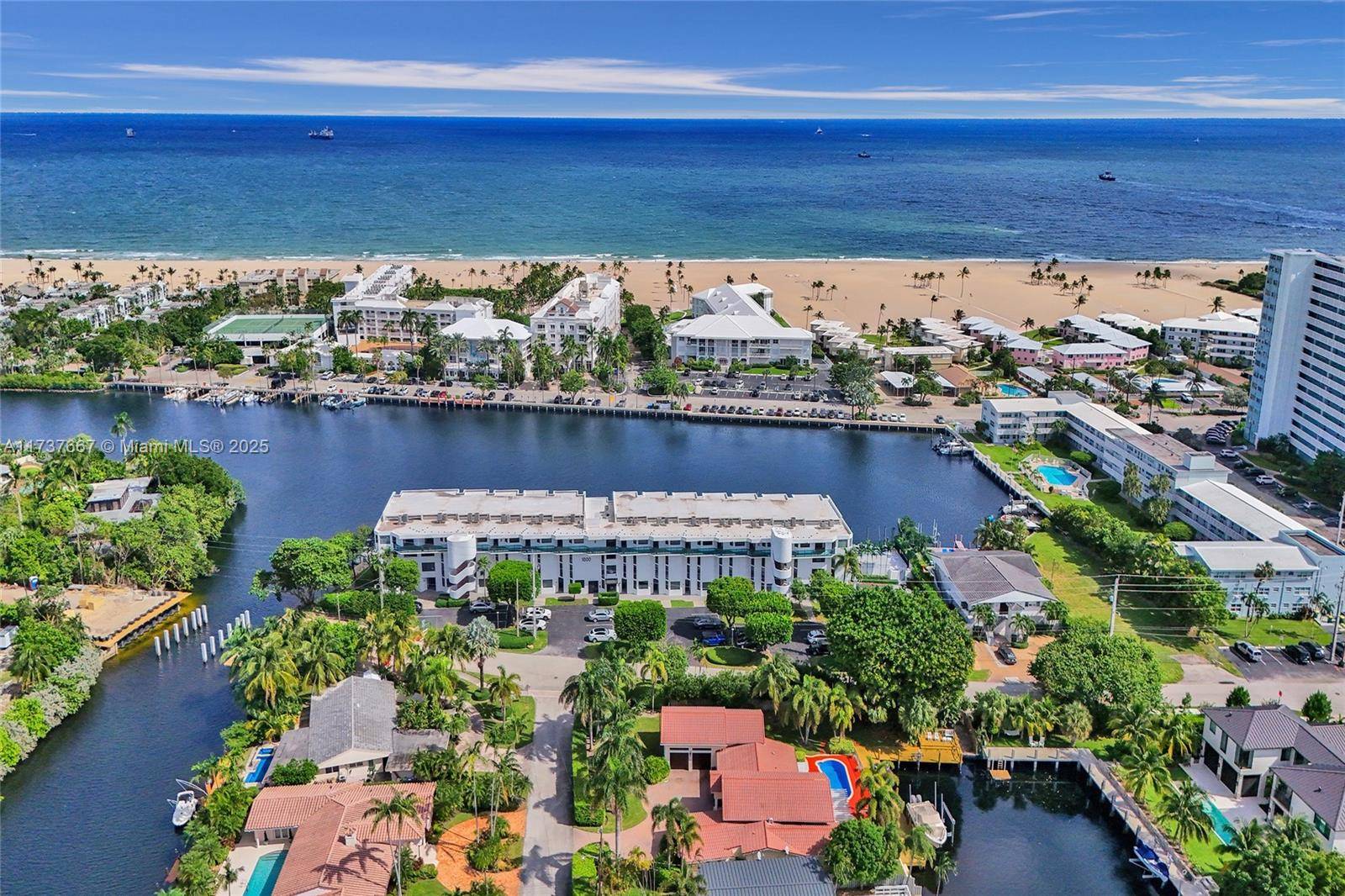 STUNNING 2430 S. F. DESIGNER WATERFRONT, BOATER'S DREAM, FULLY REMODELED 2 story HARBOR BEACH TOWNHOME.