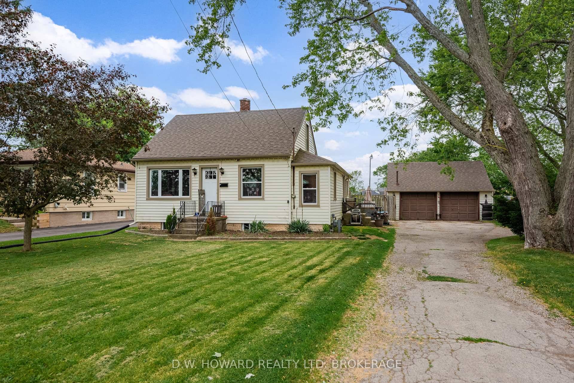 Stevensville Location highlights this desirable bungalow with detached garage and private rear yard.