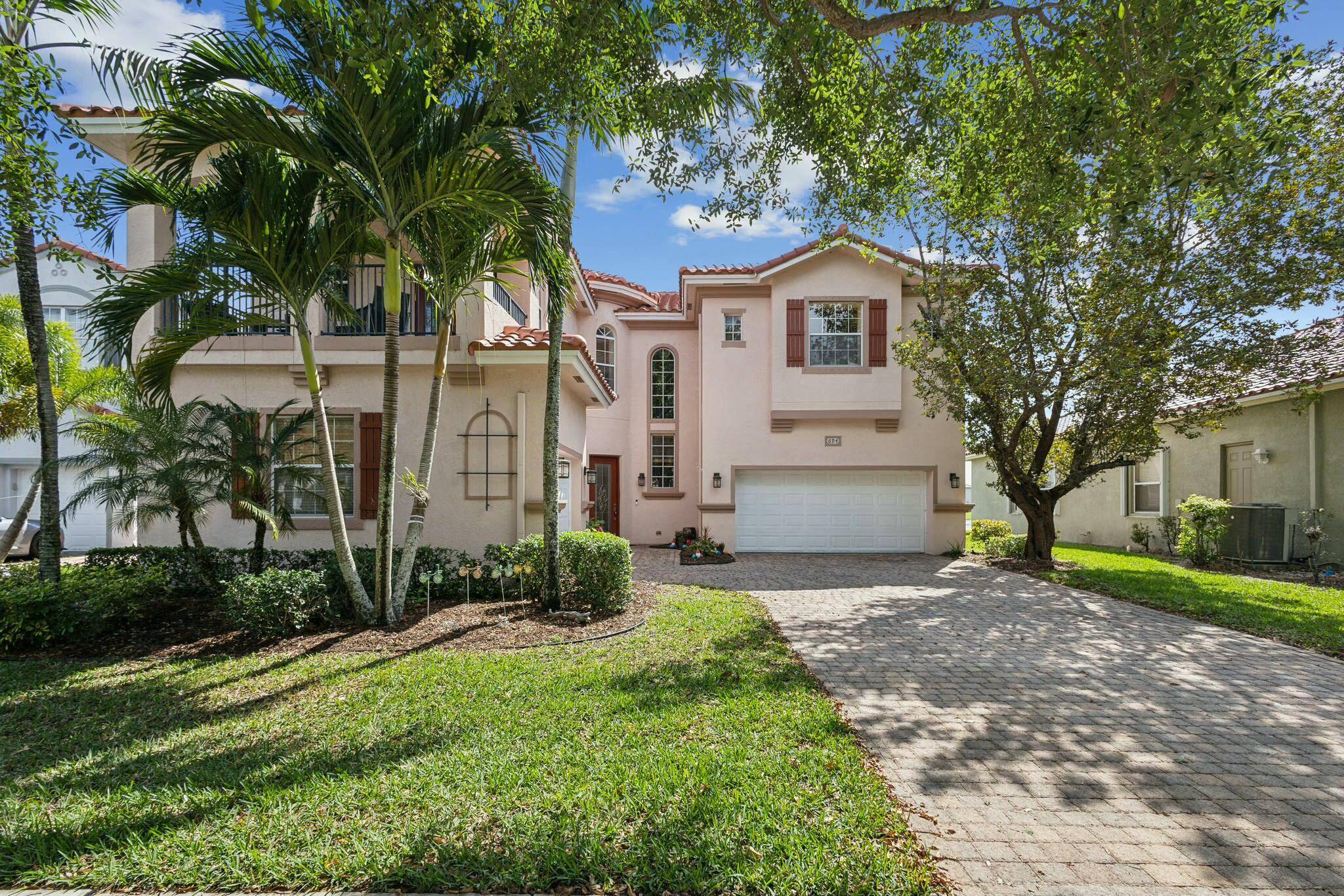 Welcome home ! This beautiful lakefront property is in the desirable gated community of Terracina.