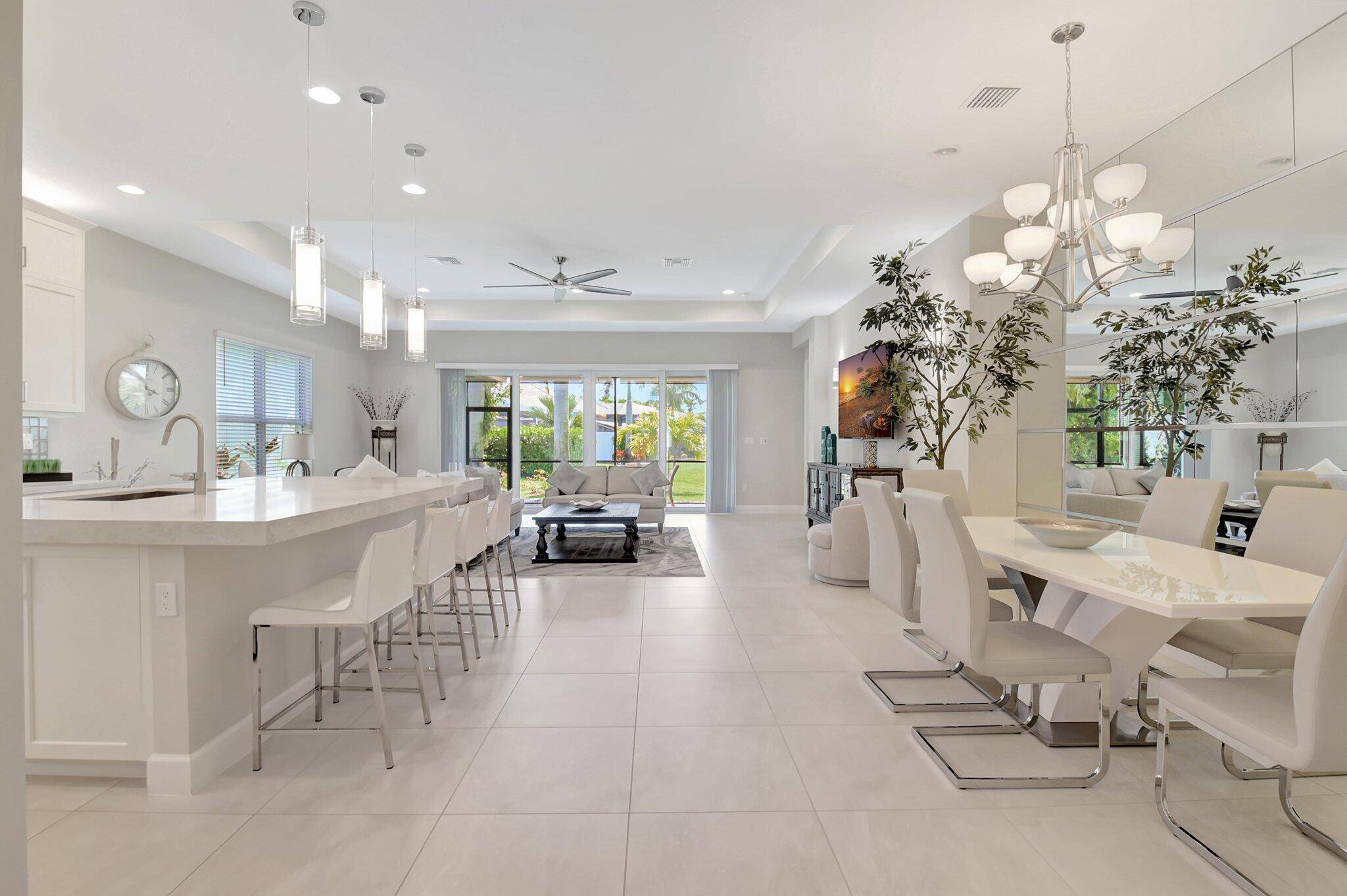 This stunning home features 3 spacious bedrooms and 2 1 2 baths, located in one of South Florida's most sought after communities.