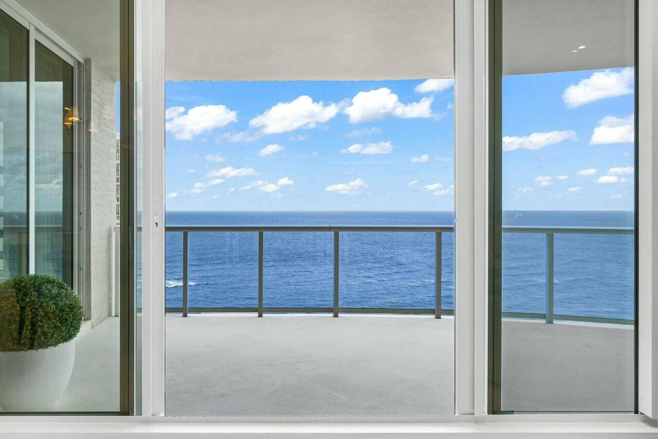 This rarely available two bedroom plus den, two and a half bathroom residence offers breathtaking, direct ocean views from every window.